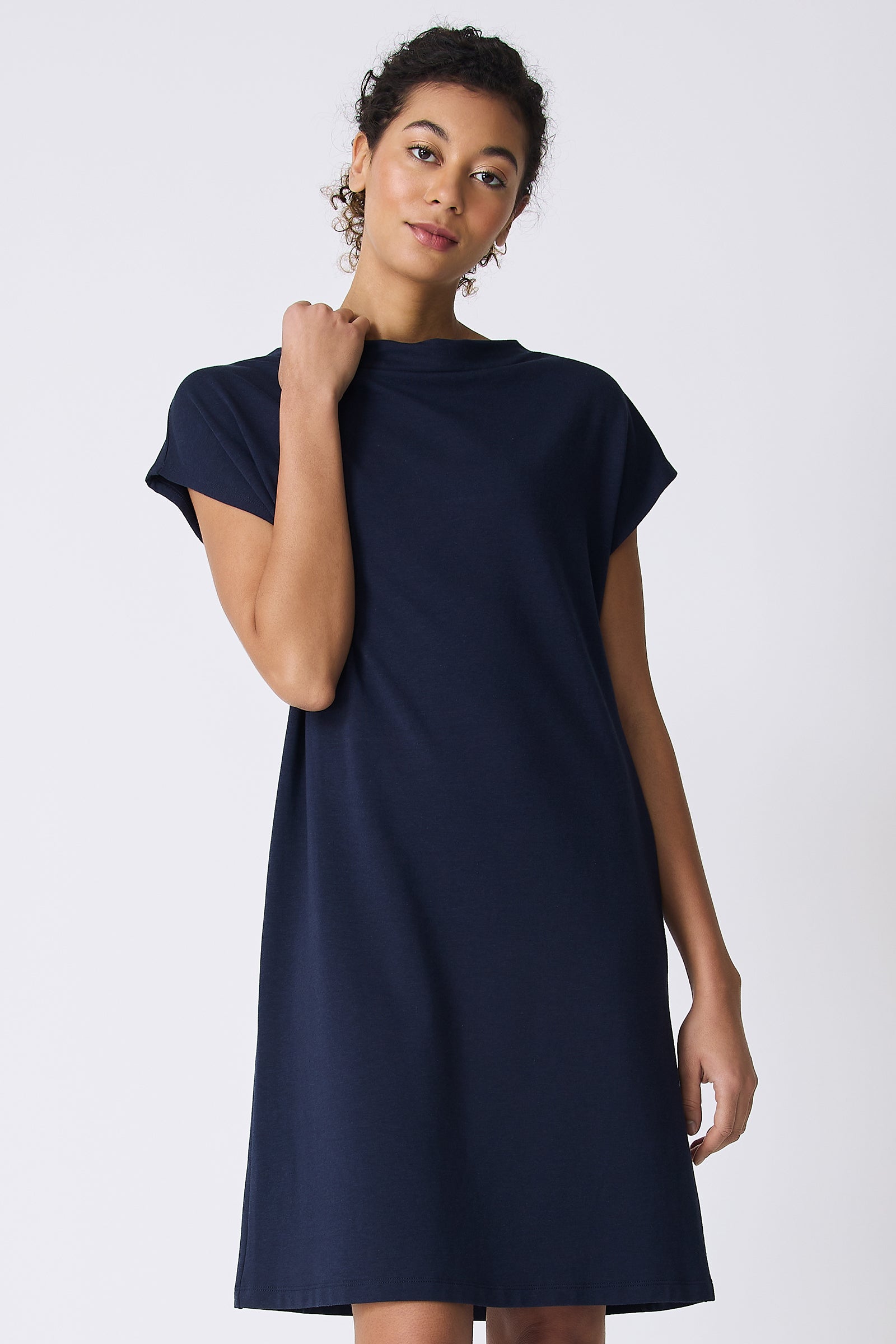 Kal Rieman Luca Cowl Dress in Navy on model touching collar front view