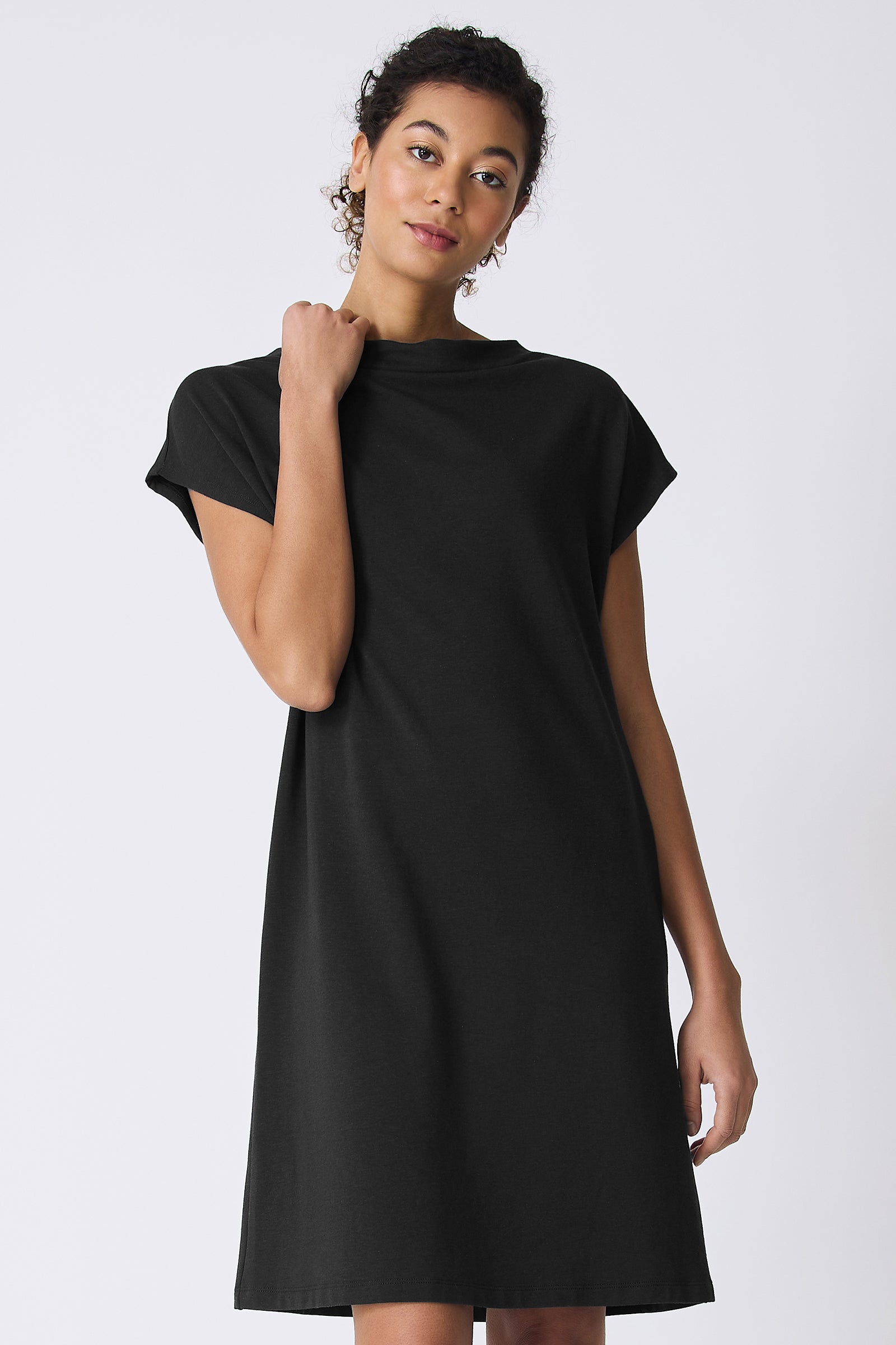 Kal Rieman Luca Cowl Dress in Black on model touching collar front view