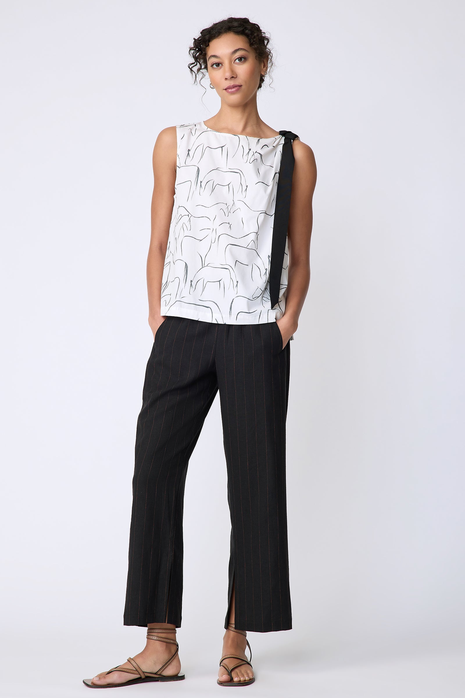 Kal Rieman Lucy Ribbon Top in horse print on model front view full look hands in pockets