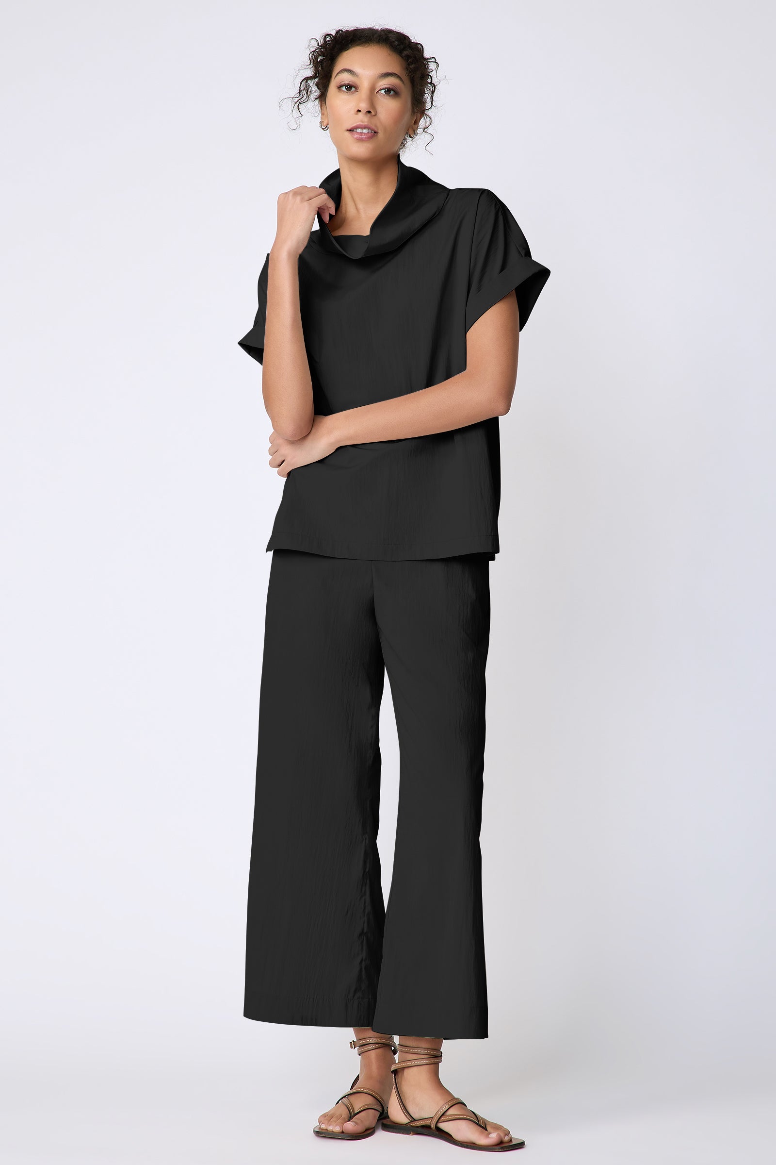 Kal Rieman Maggie Top in Typewriter Cloth black on model front view full look holding collar