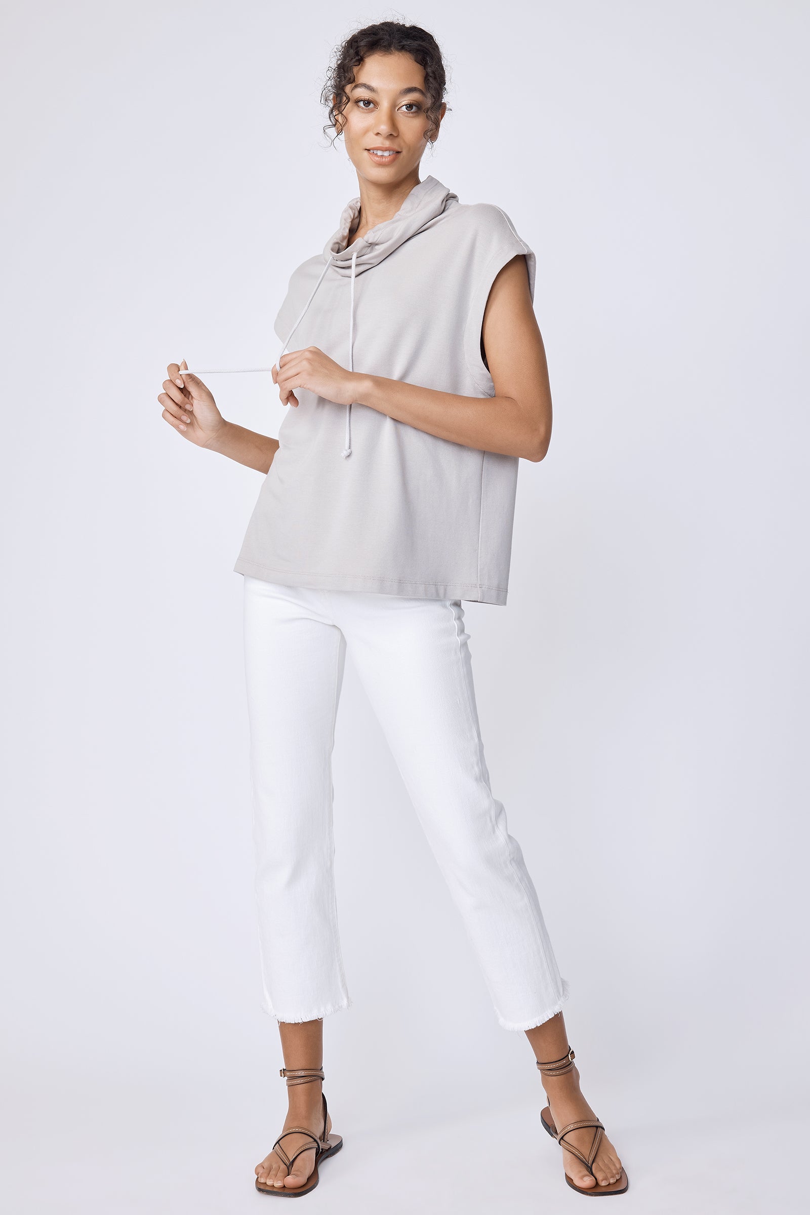 Kal Rieman Margie Tee in taupe bamboo terry on model holding ties full front view