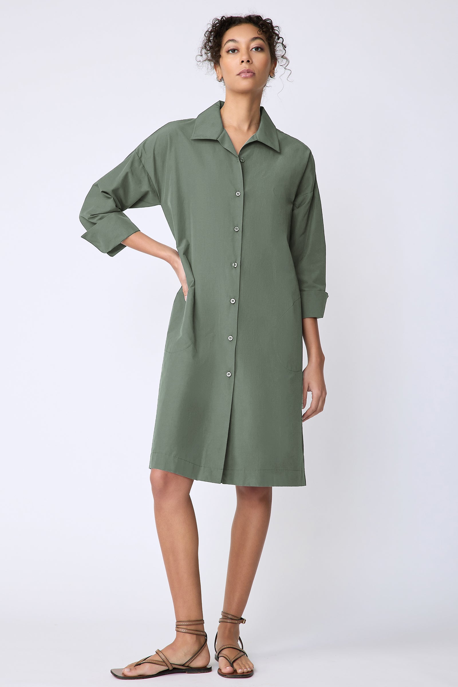 Kal Rieman Marion Dress in Cactus broadcloth on model hand on hip