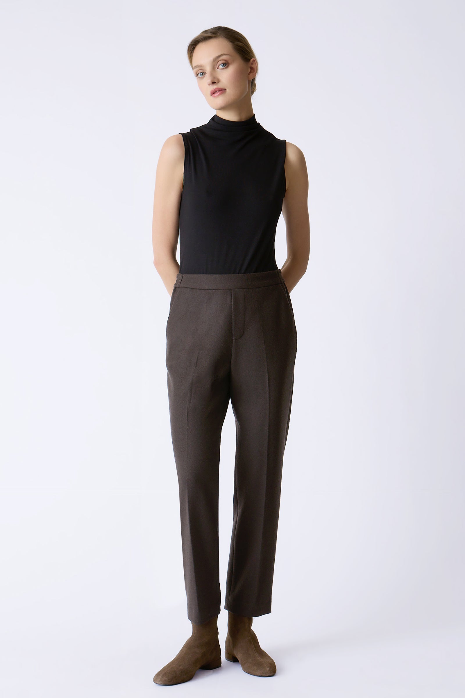 Kal Rieman Martine Trouser in Espresso on model with hands behind back full front view