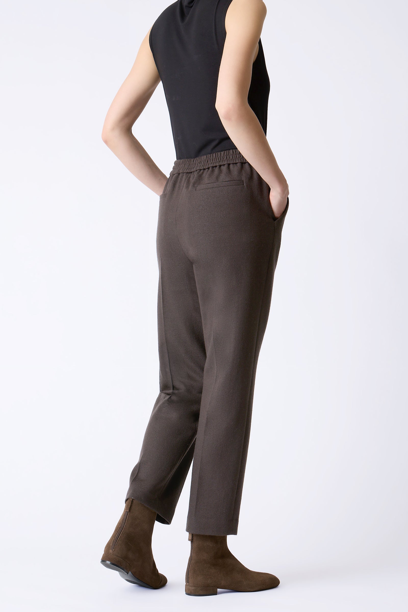 Kal Rieman Martine Trouser in Espresso on model with hands behind back full front view