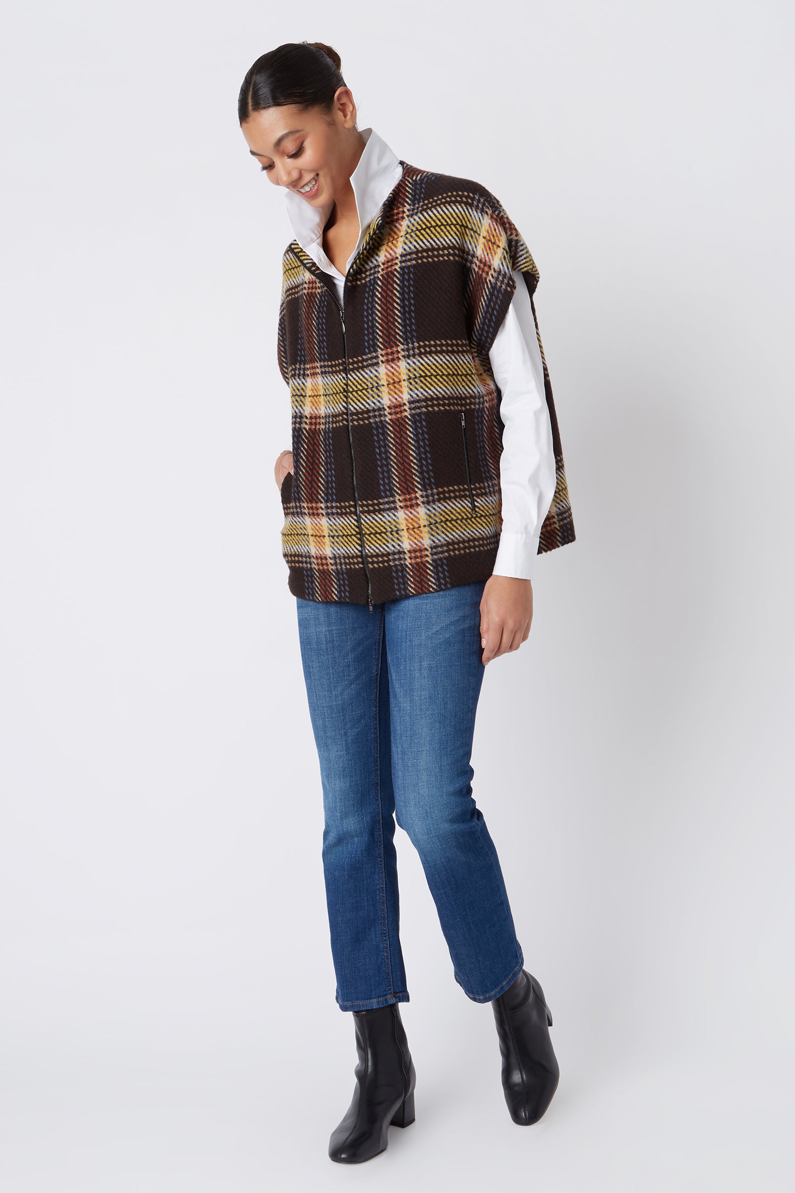 Kal Rieman Mina Zip Vest in Bold Plaid on Model Looking Down Full Front View