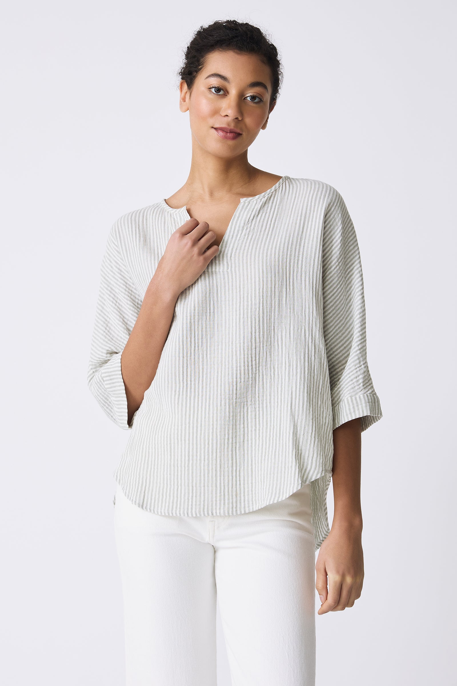 Kal Rieman Nora Notch Front Top in Sage Stripe on model touching shirt front view