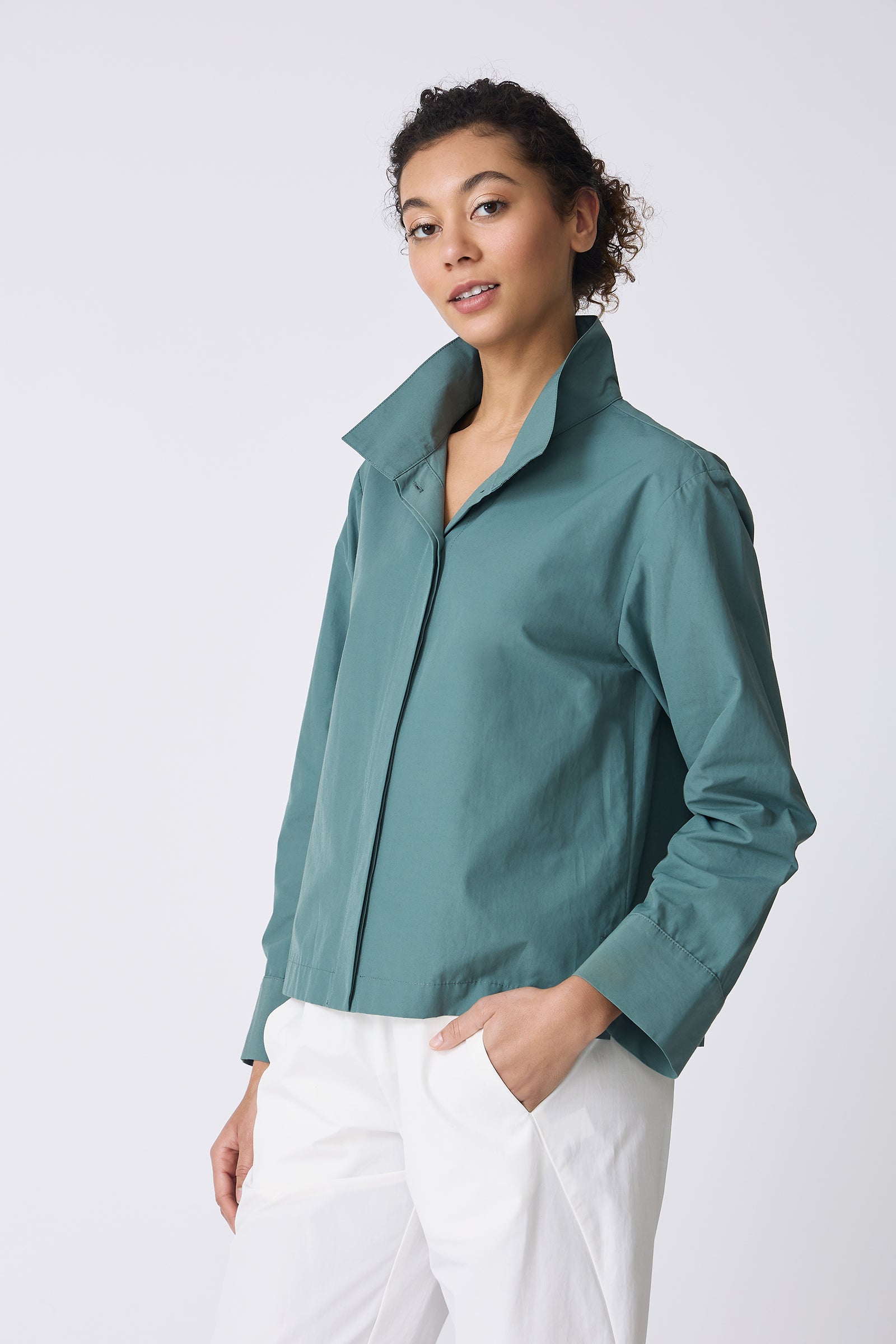 Kal Rieman Peggy Collared Shirt in Sage on model with hand in pocket front view