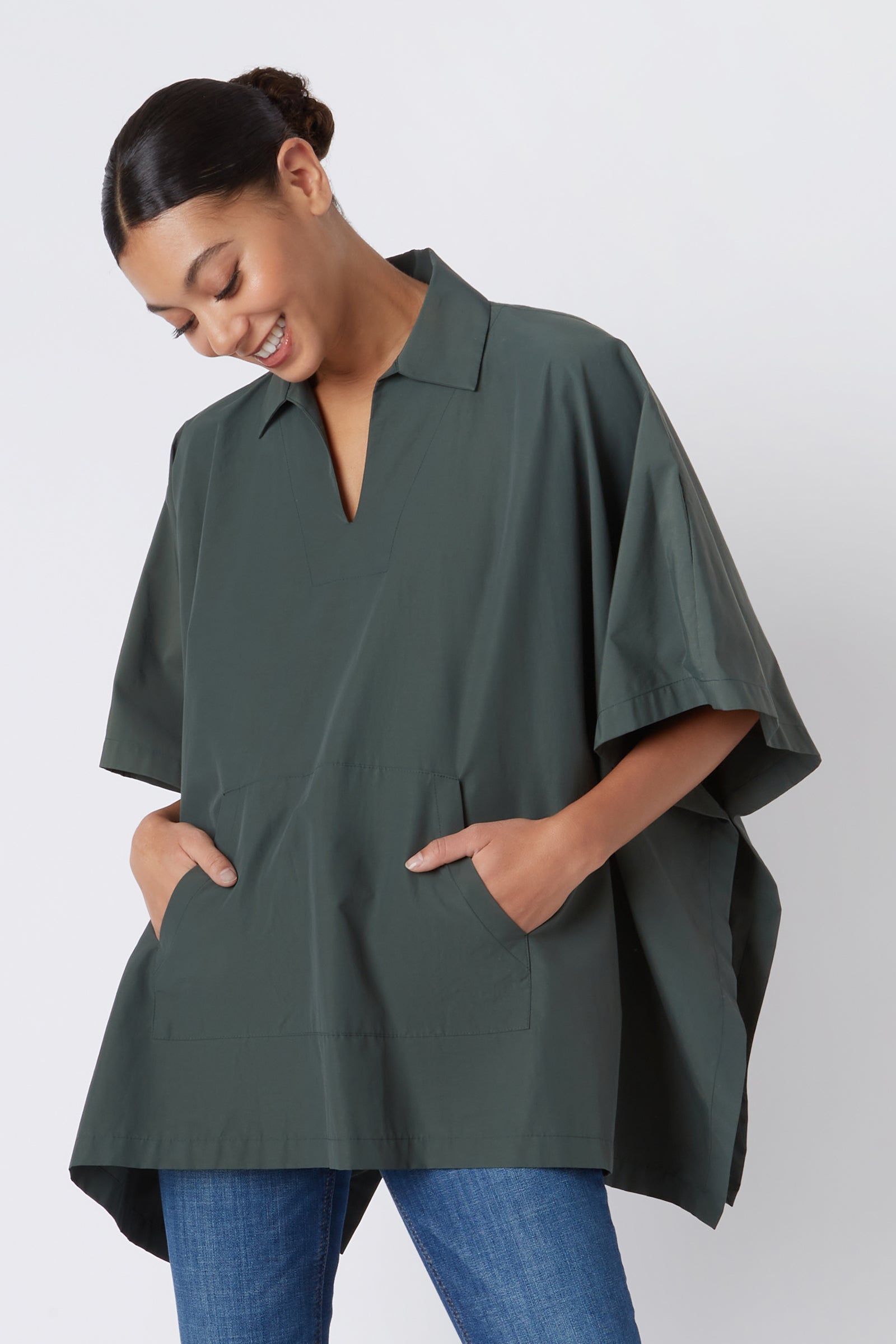 Kal Rieman Pocket Poncho in Loden on Model Looking Down Cropped Front View