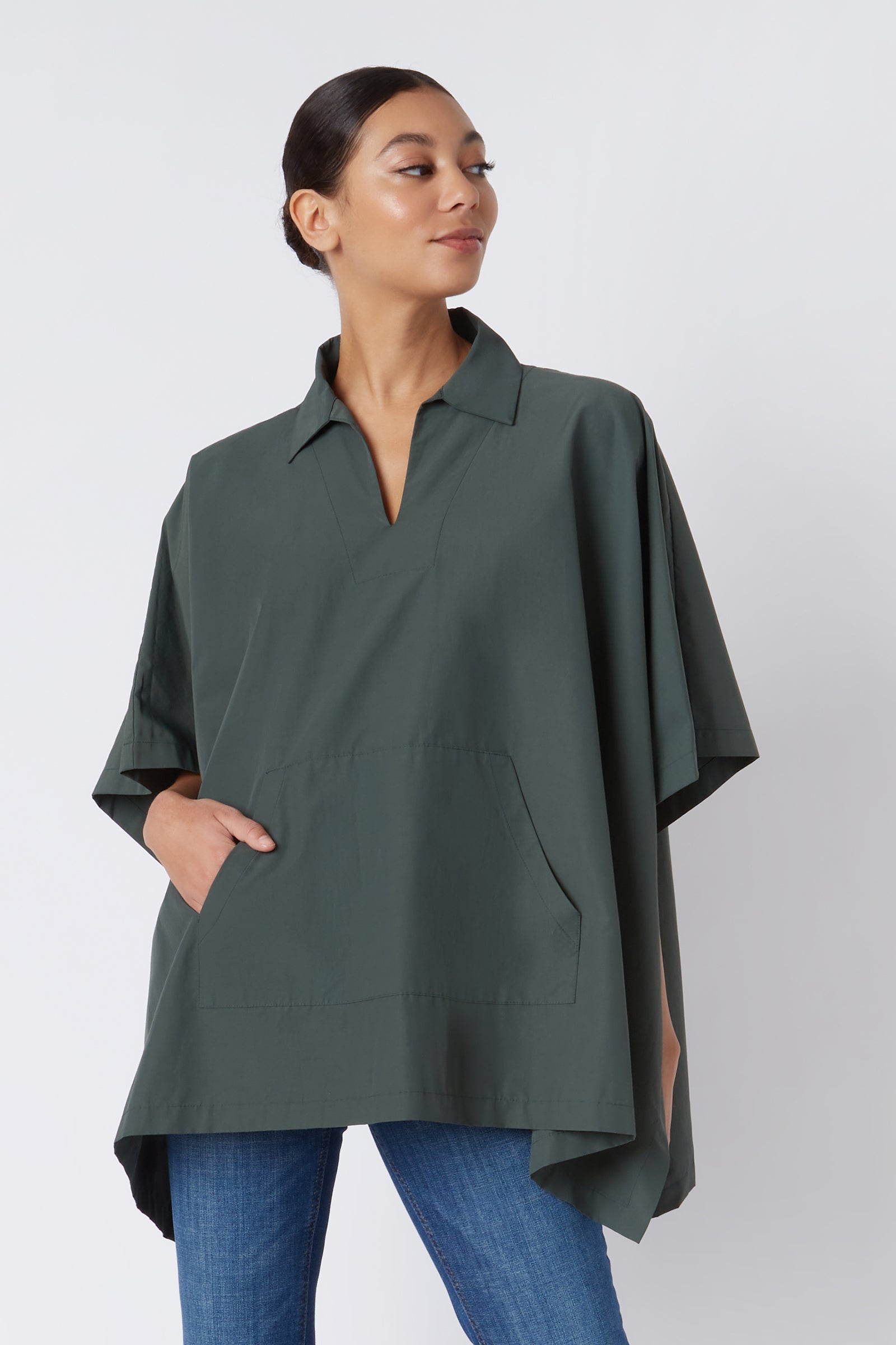 Kal Rieman Pocket Poncho in Loden on Model with Hand in Pocket Cropped Front View