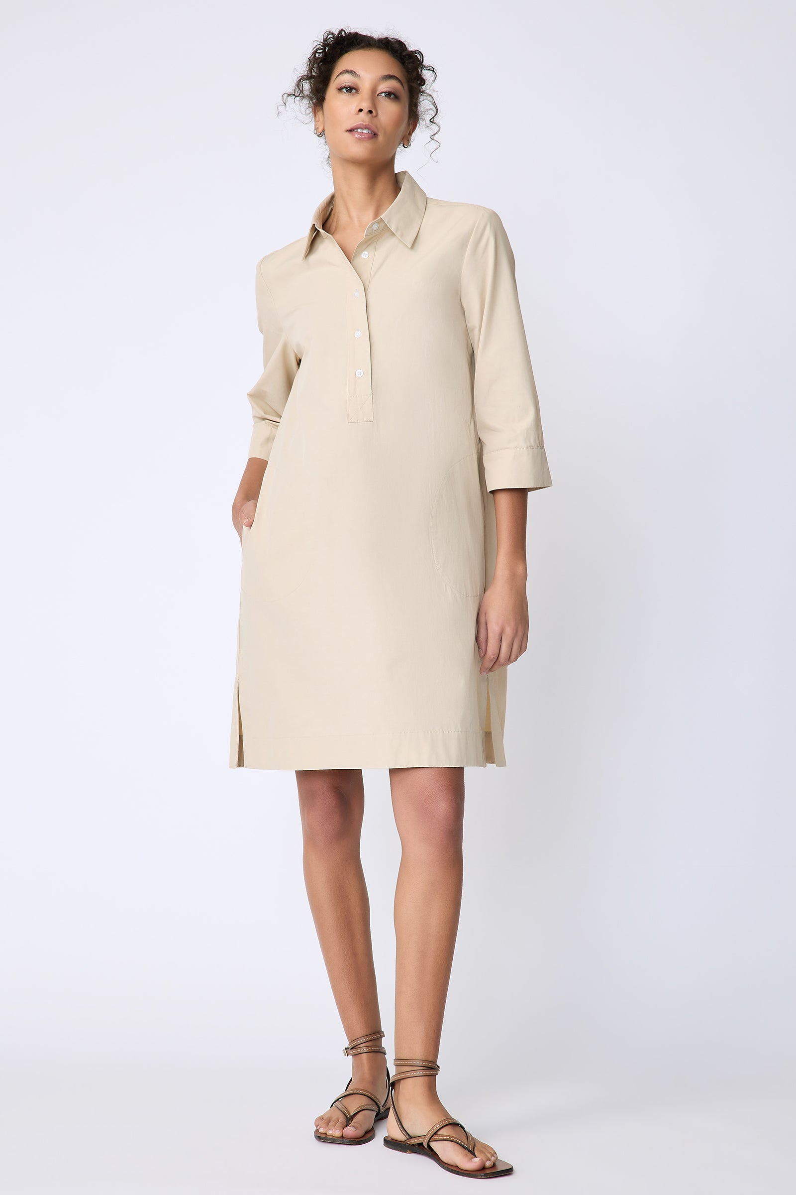 Kal Rieman Rene Placket Dress in Italian Broadcloth color sand on model front view hand in pocket