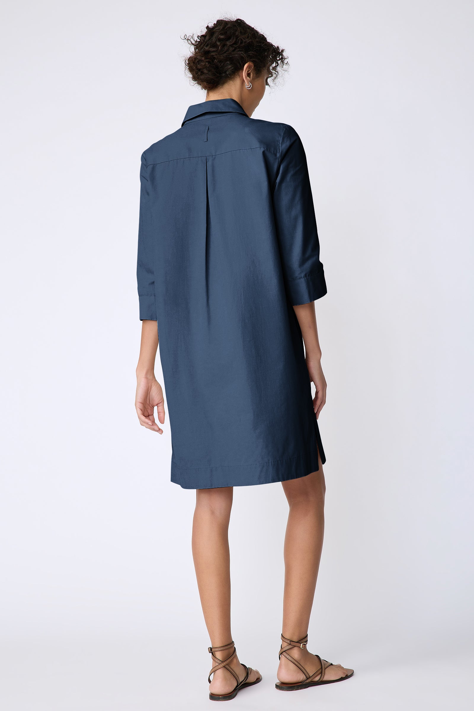 Kal Rieman Rene Placket Dress in Italian Broadcloth color summernavy on model front view holding collar