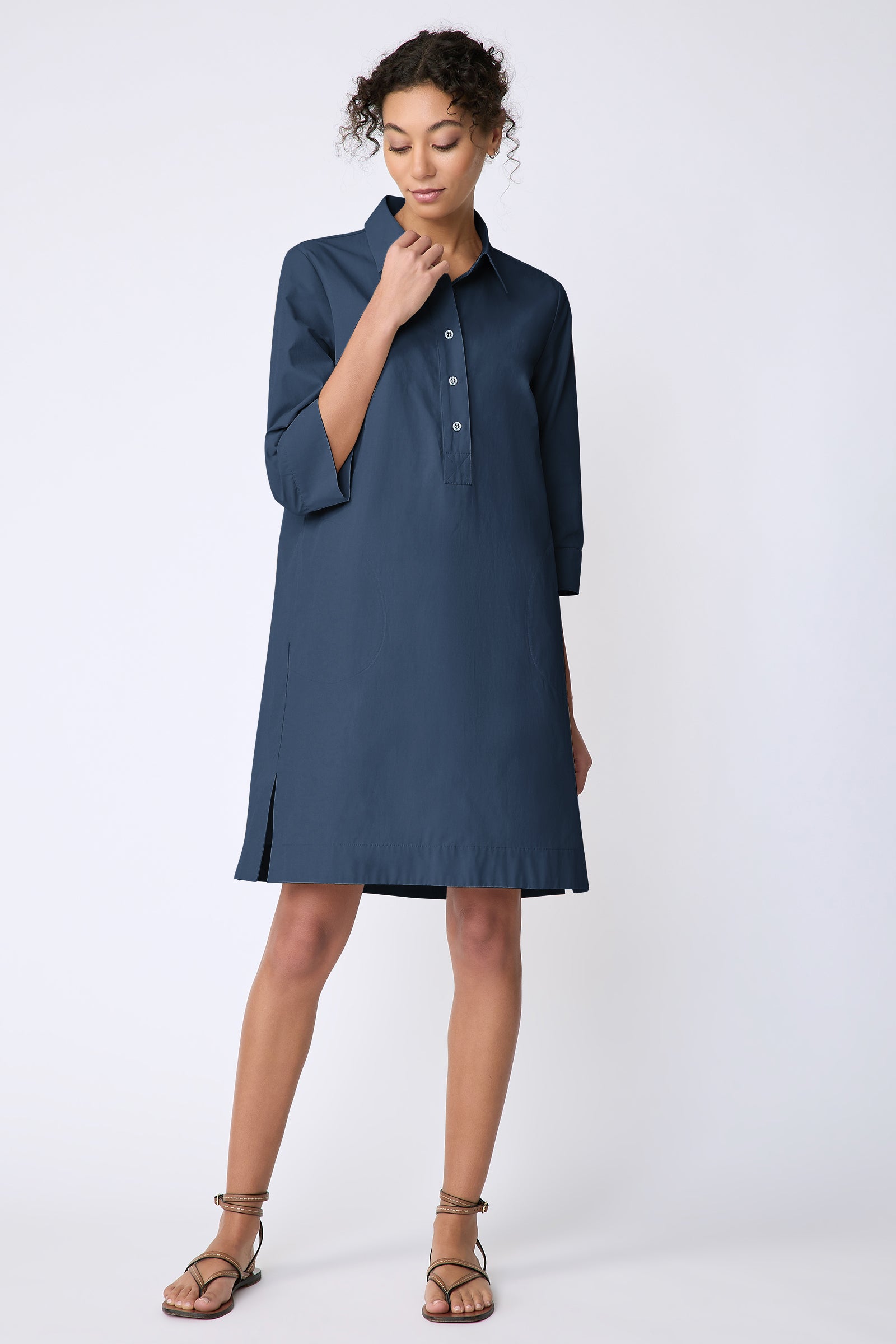 Kal Rieman Rene Placket Dress in Italian Broadcloth color summernavy on model front view holding collar