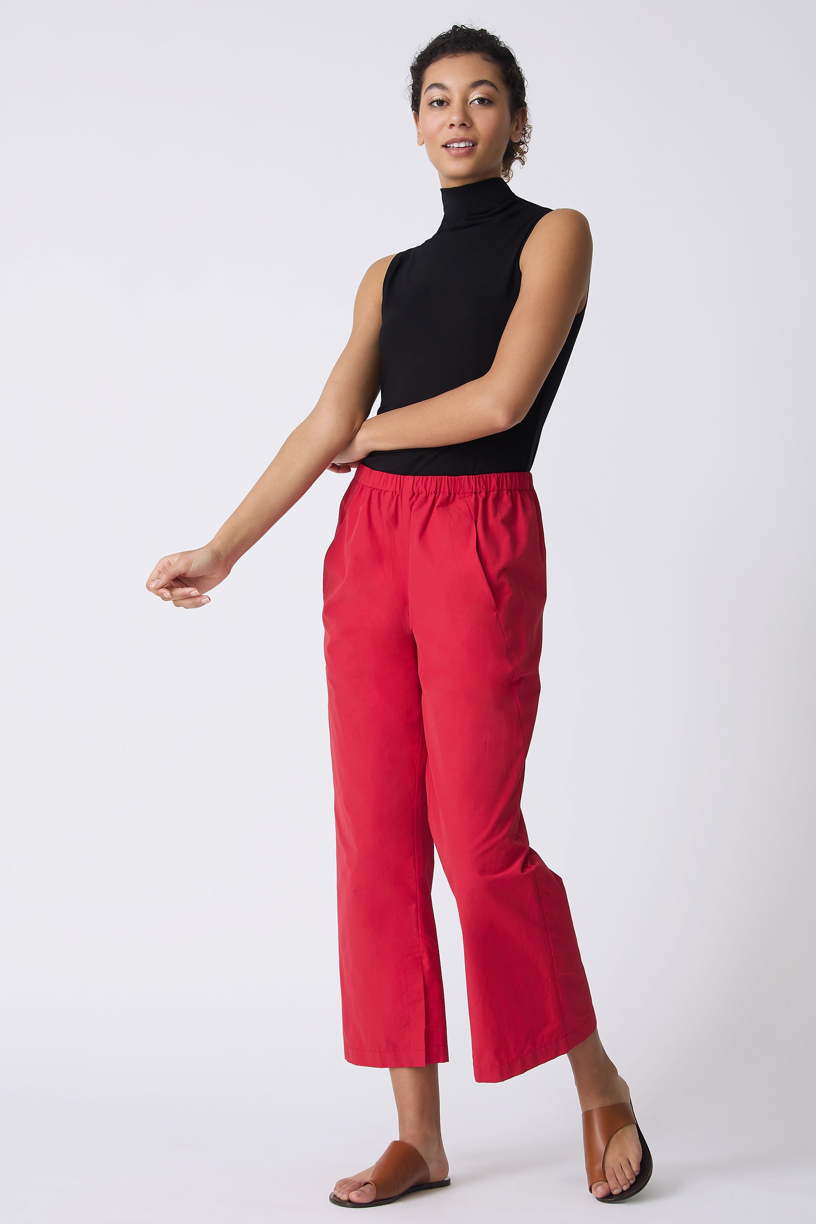 Kal Rieman Split Hem Capri in Red Broadcloth on model with arm out full front view