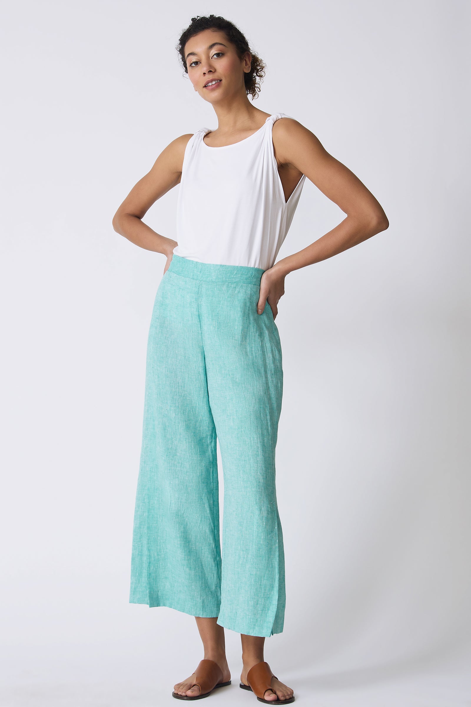 Kal Rieman Tami Side Kick Pant in Green on model with hands on hips full front view