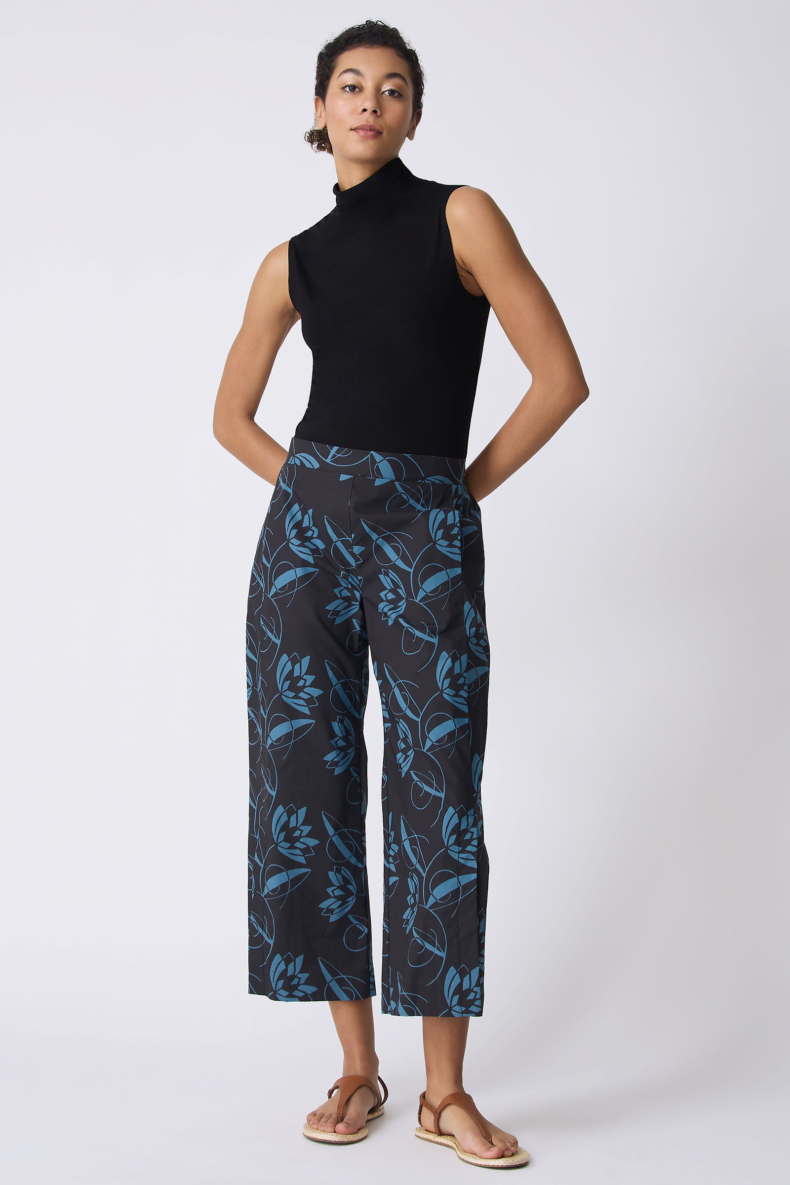 Kal Rieman Tami Side Kick Pant in Lotus Print Blue on model with hands behind back full front view
