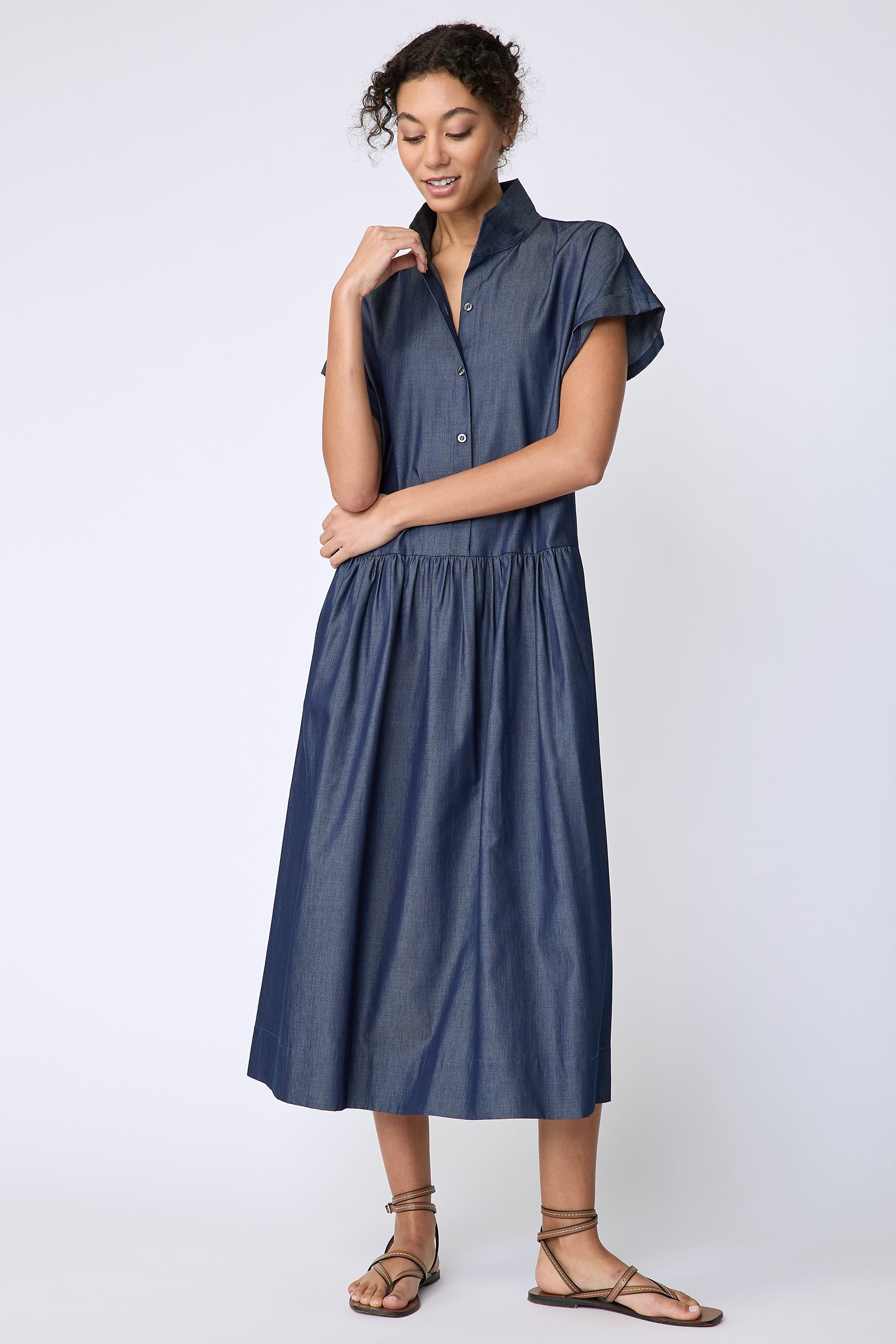 Kal Rieman Tanya Dress in Indigo light weight denim on model front view holding collar