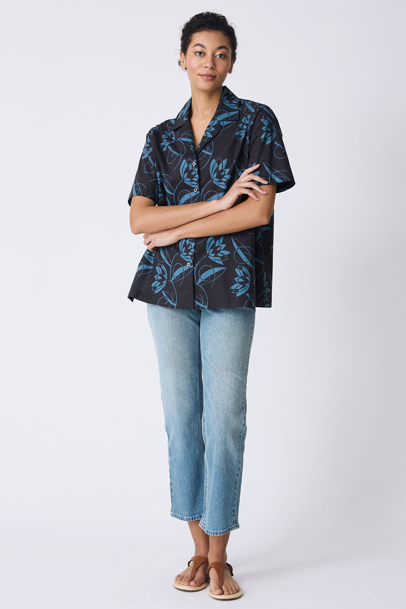 Kal Rieman Vacation Shirt in Lotus Print Blue on model with arms crossed full front view