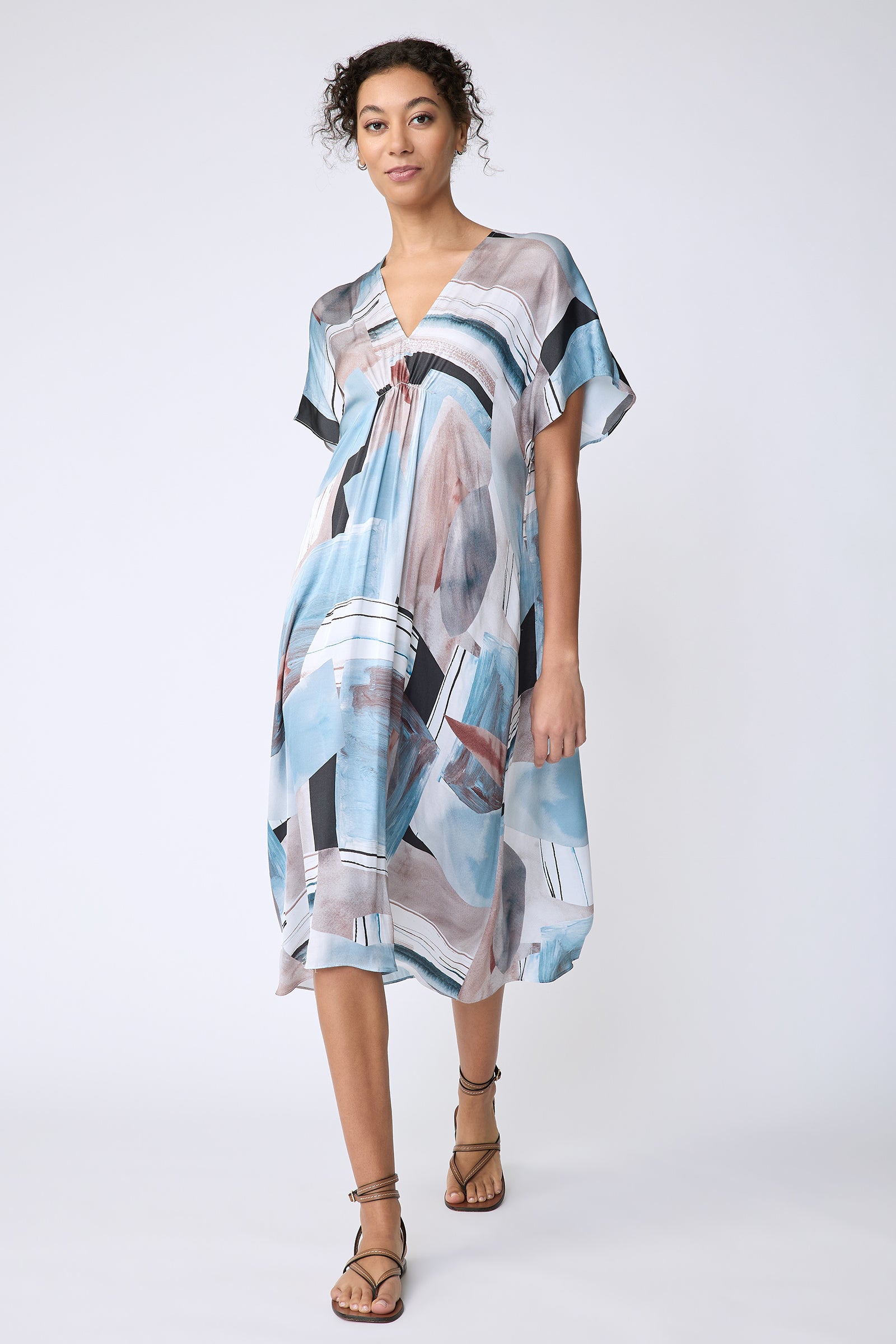 Kal Rieman Vanna Dress in Sante Fe Print blue on model front view walking