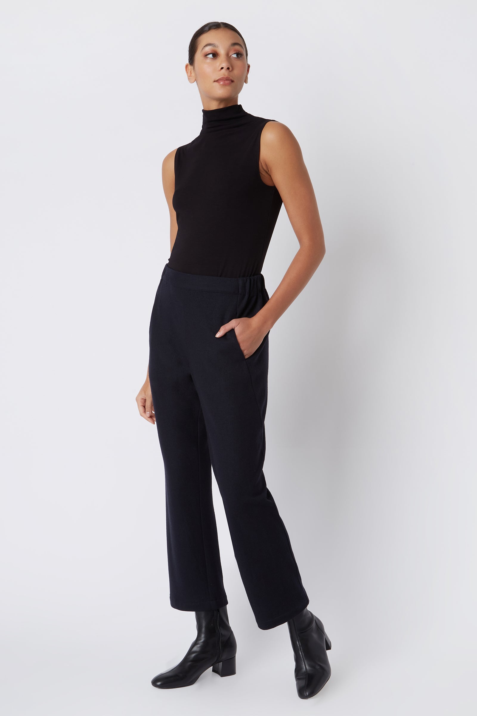 Kal Rieman Felted Jersey Angle Seam Crop Pant in Midnight Felted Jersey on Model with Hand in Pocket Full Front View