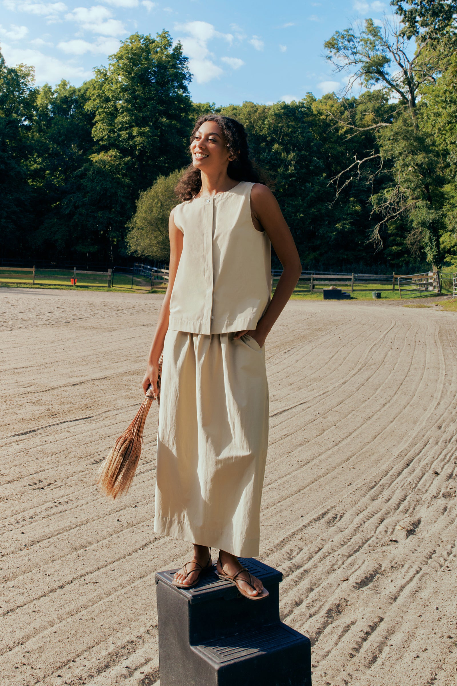 Kal Rieman Colette Shell in Italian Broadcloth sand on model front view full look hand on placket