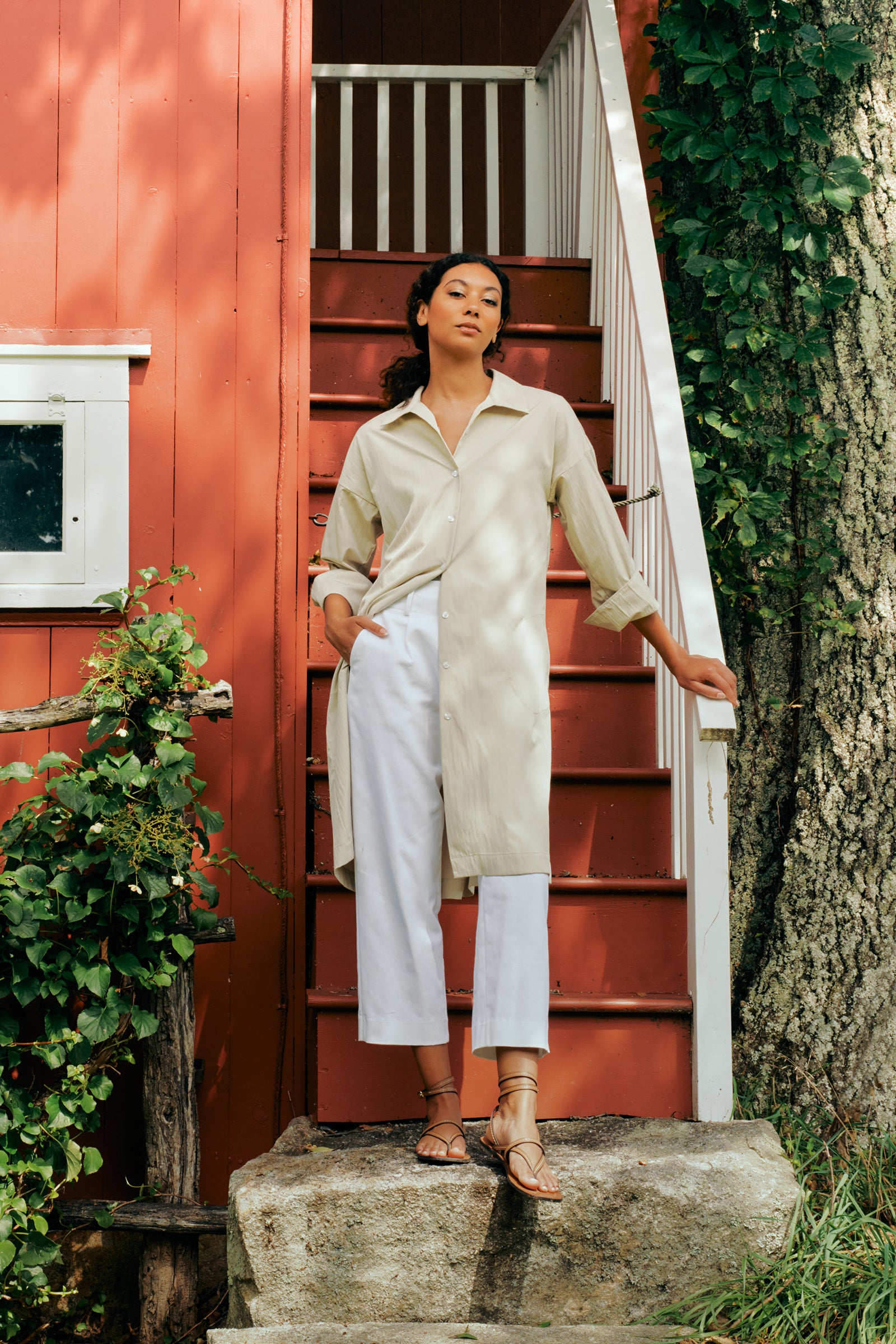 Kal Rieman Marion Shirt Dress in Typewriter cloth khaki on model front view hands behind back