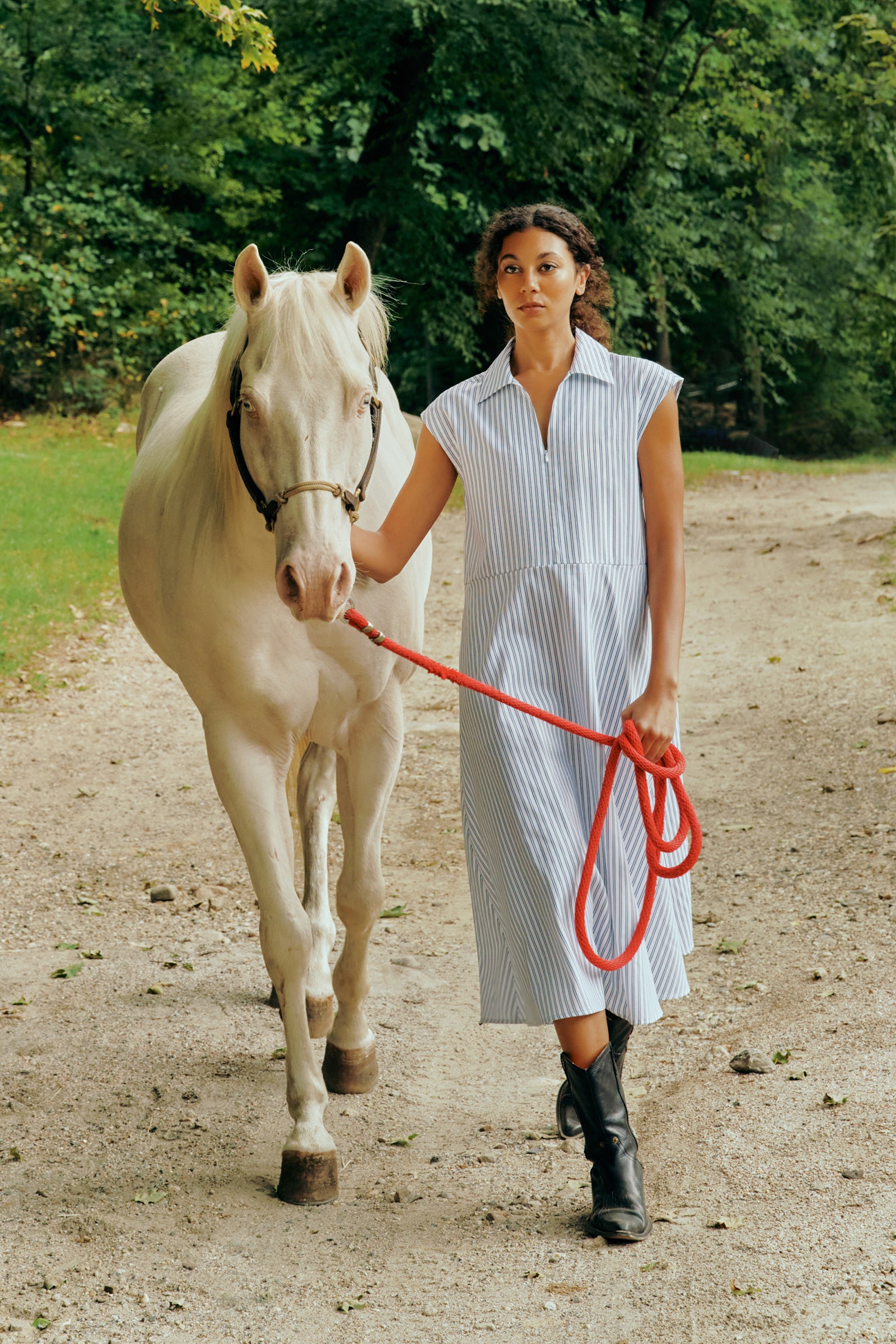 Kal Rieman Savannah Dress in European Cotton white with navy stripe on model front view arms crossed in front