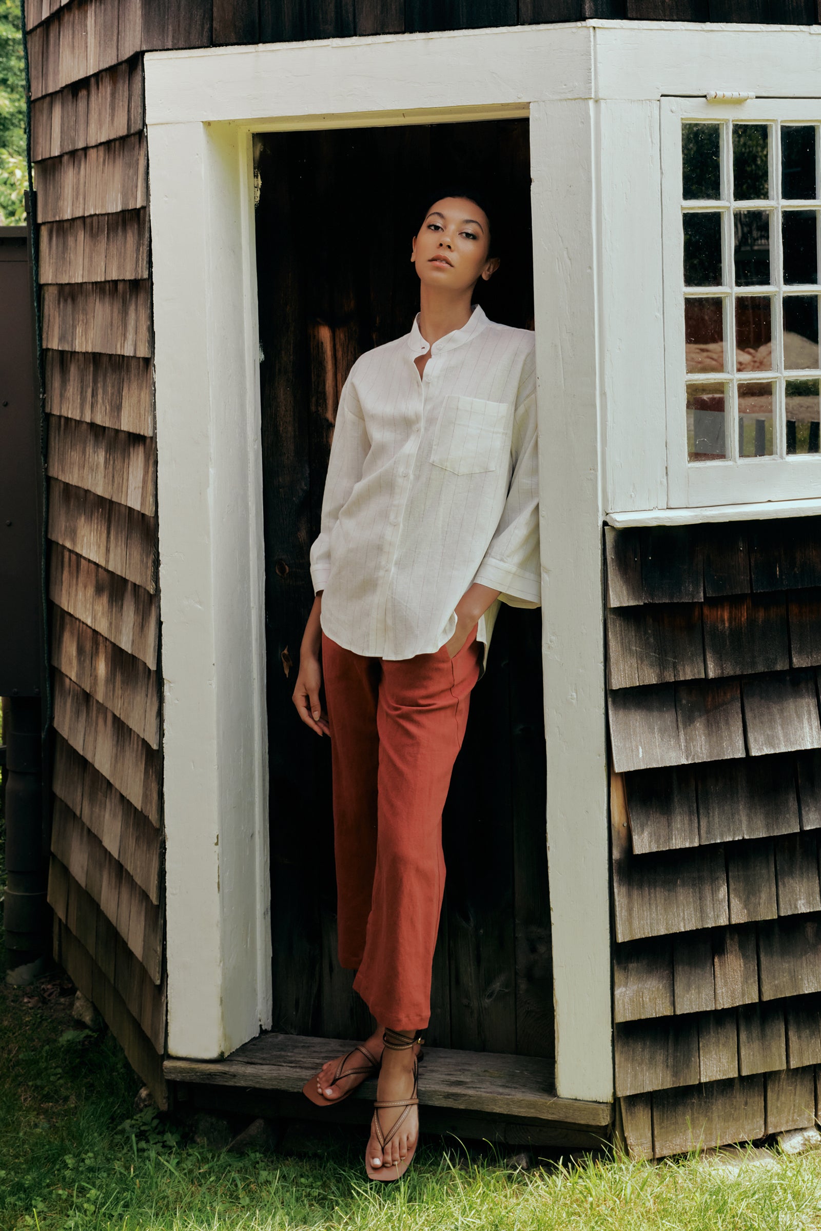Kal Rieman Valerie Top in pinstripe linen on model front view full length hand in pocket