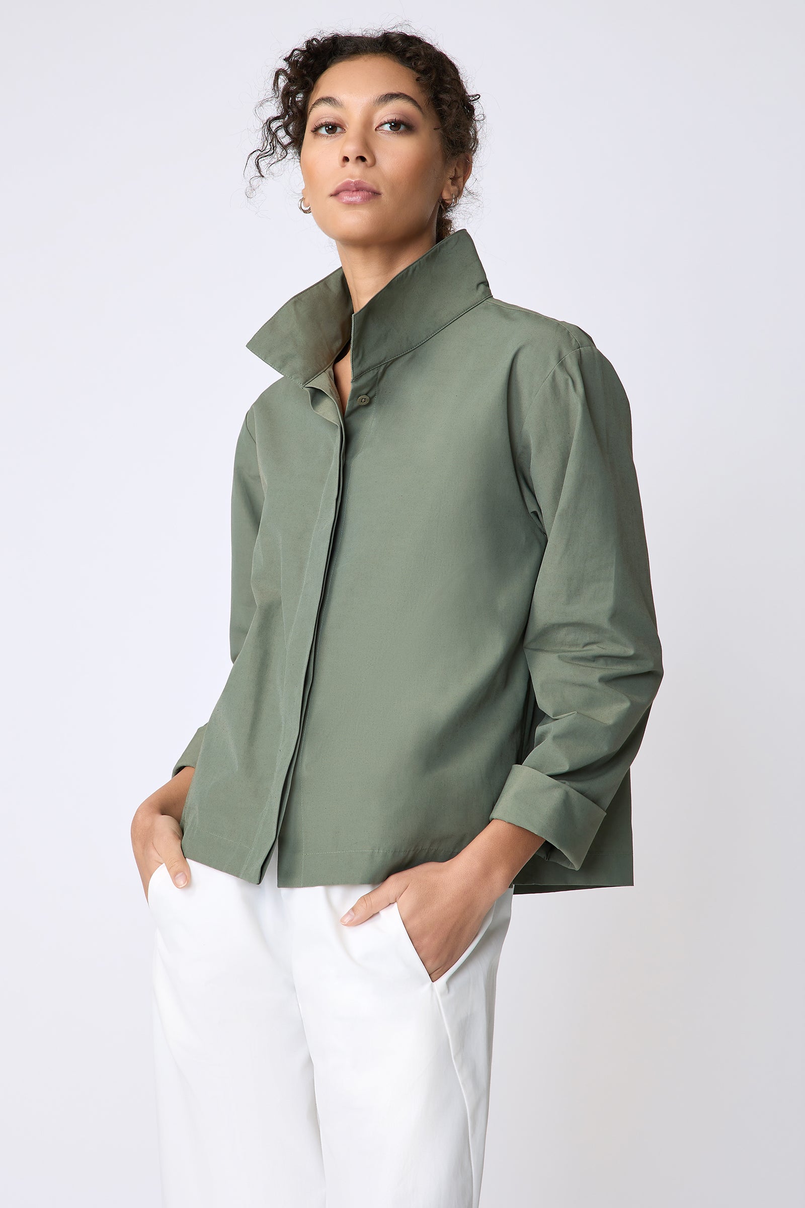 Peggy jacket in Italian Broadcloth in color cactus on model view hands in pockets