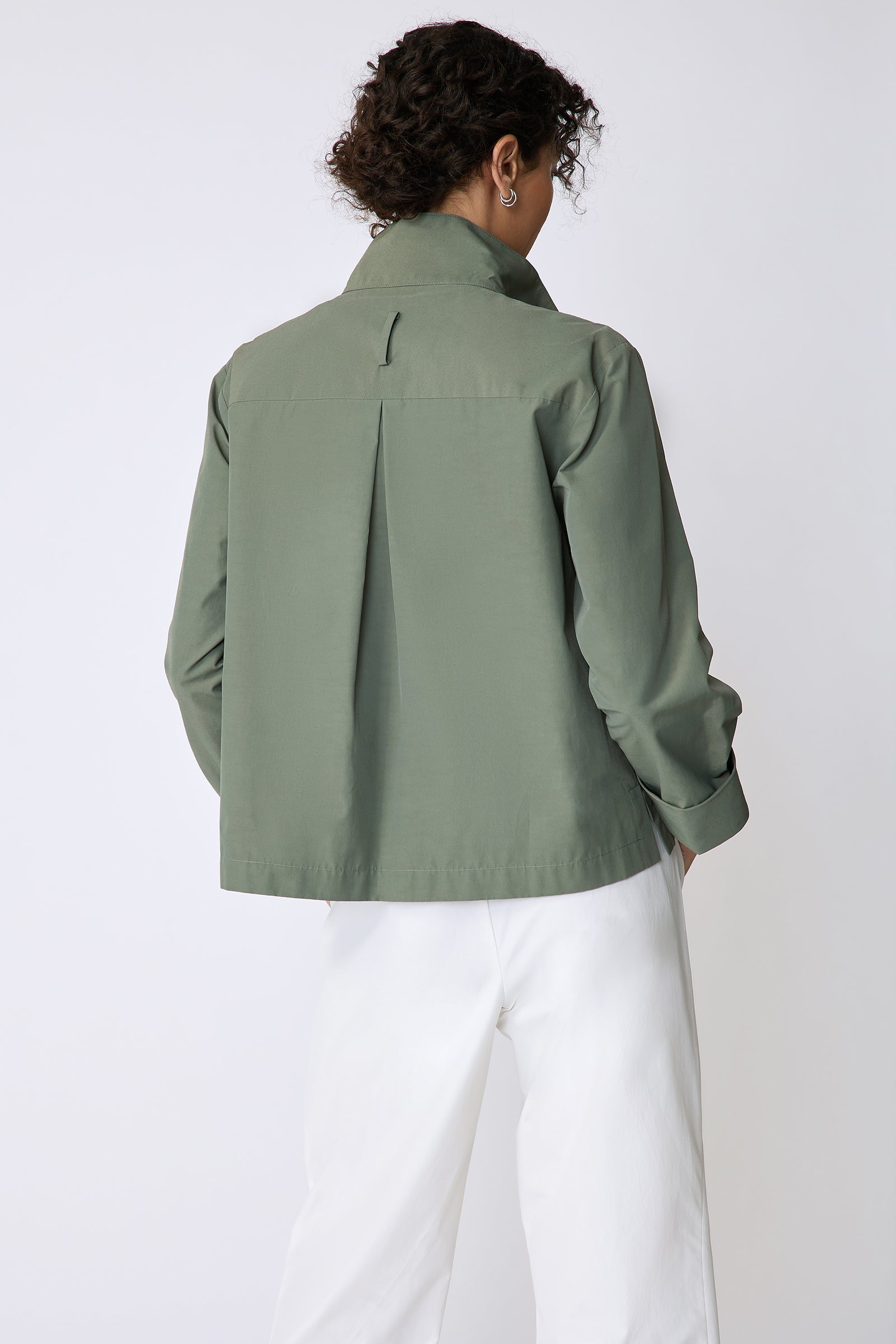 Peggy jacket in Italian Broadcloth in color cactus on model view hands in pockets