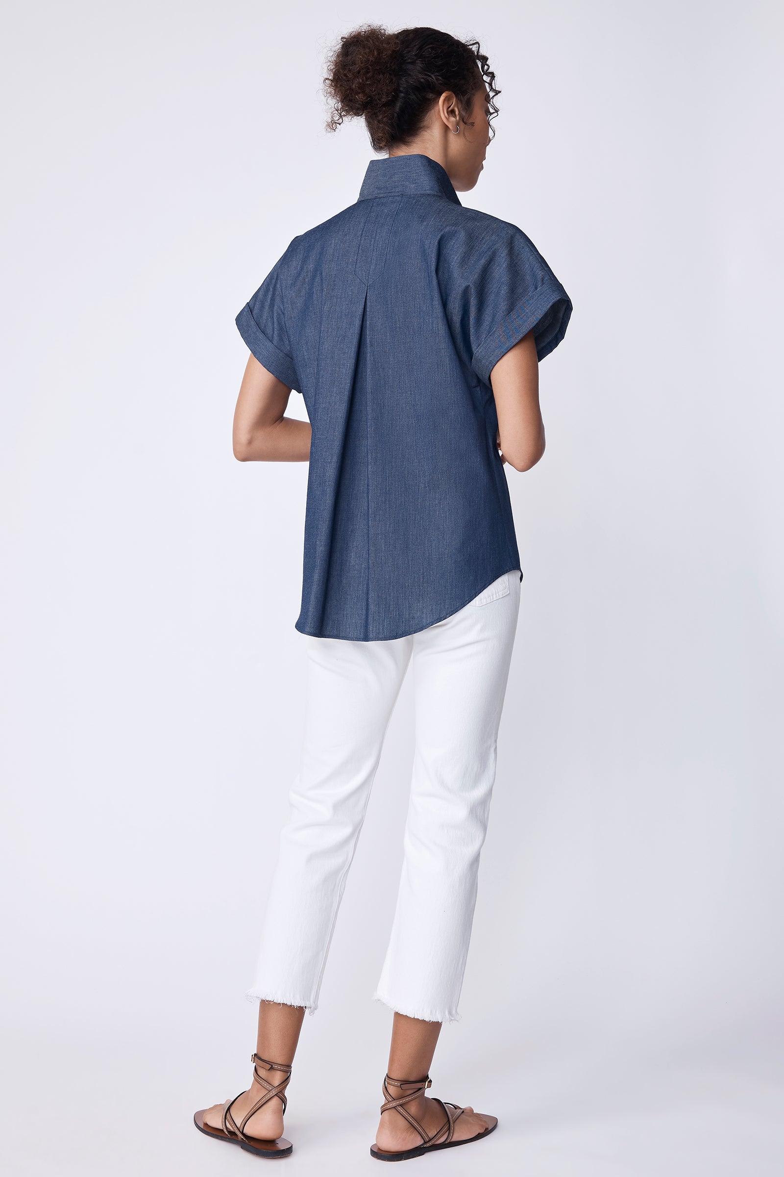 Kal Rieman Ali Kimono Shirt in lightweight indigo denim on model with hand on hip full front view