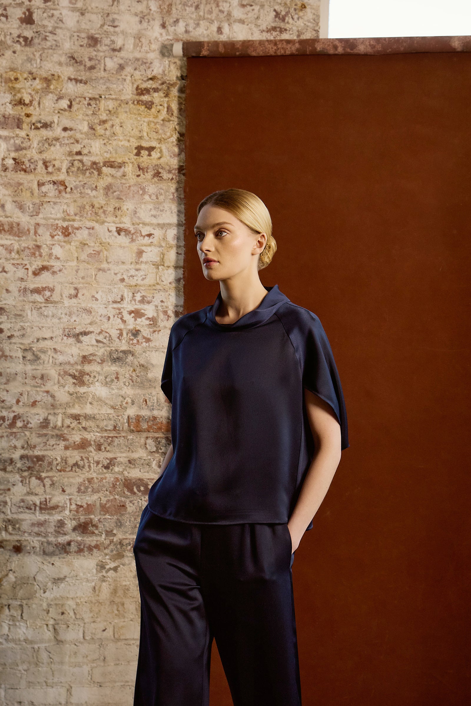 Kal Rieman Angelica Cape Top in Navy on model full front view