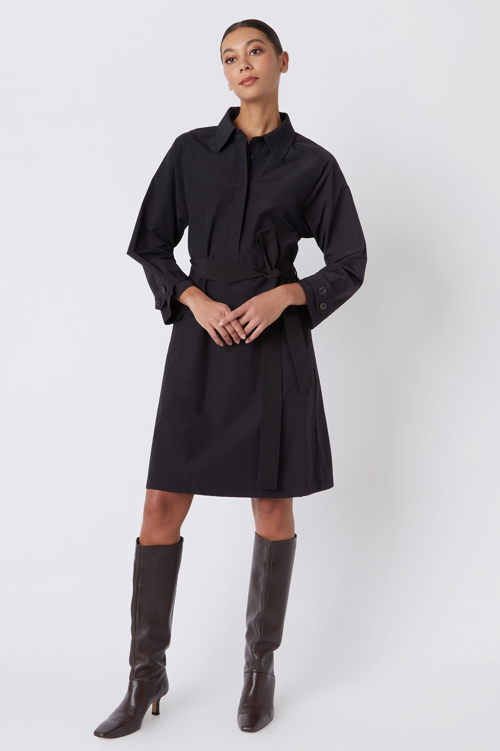 Kal Rieman Bonnie Pleat Back Dress in Black Italian Broadcloth on Model with Hands in Front Full Front View