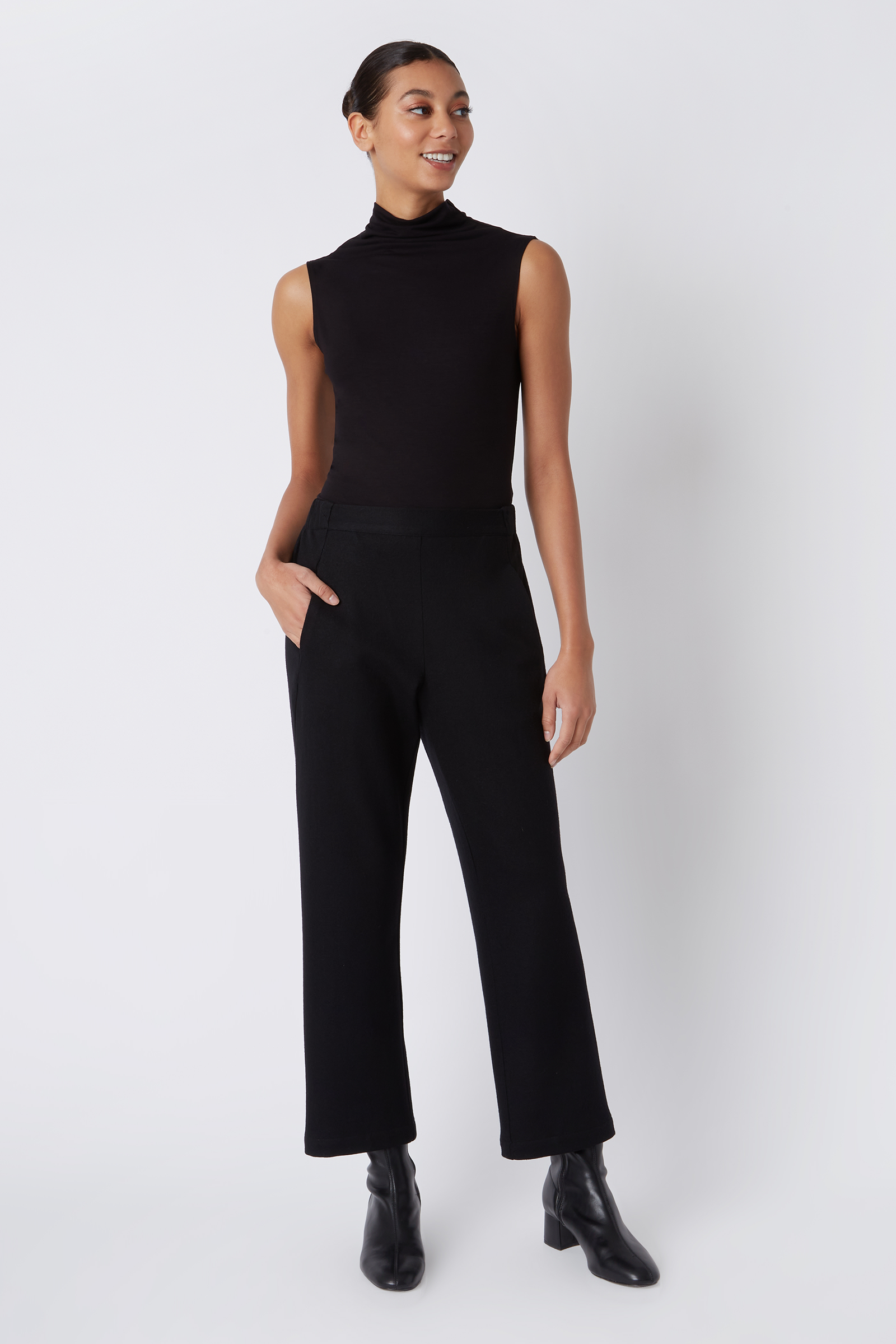 Kal Rieman Felted Jersey Angle Seam Crop Pant in Black Felted Jersey on Model Smiling Full Front View
