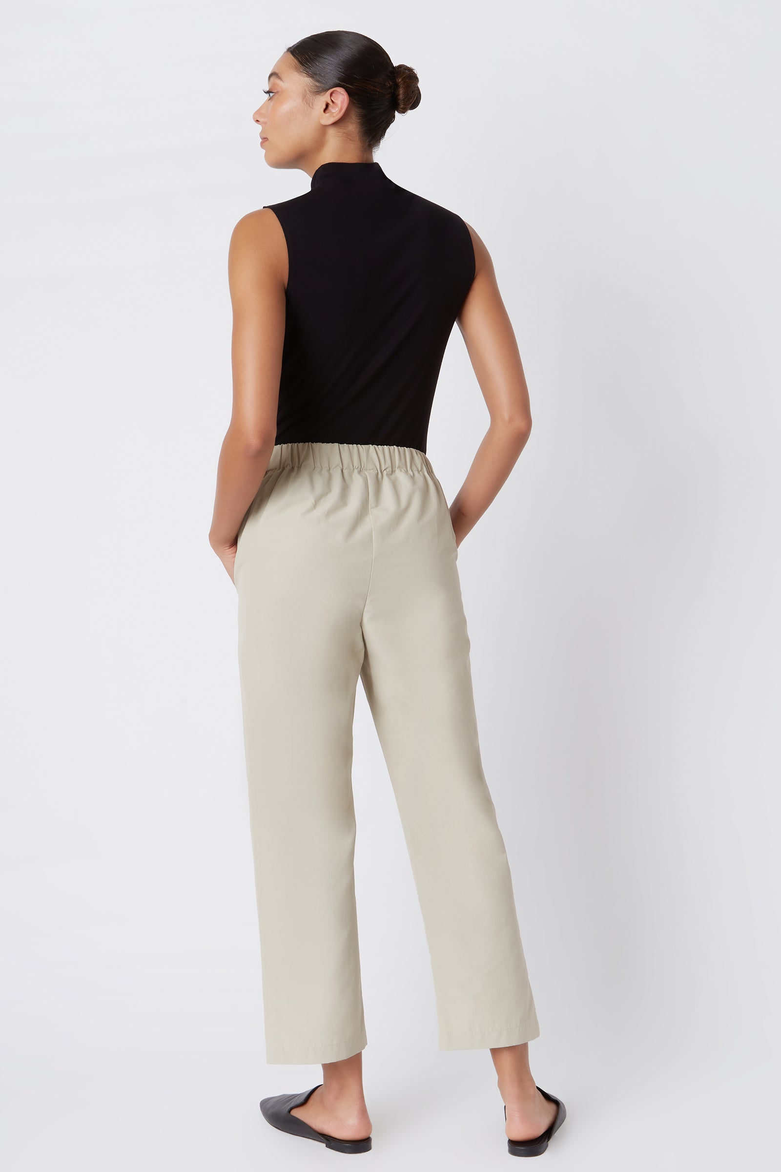Kal Rieman Brit Crop Pant in Classic Khaki on Model with Hand in Pocket Full Front View