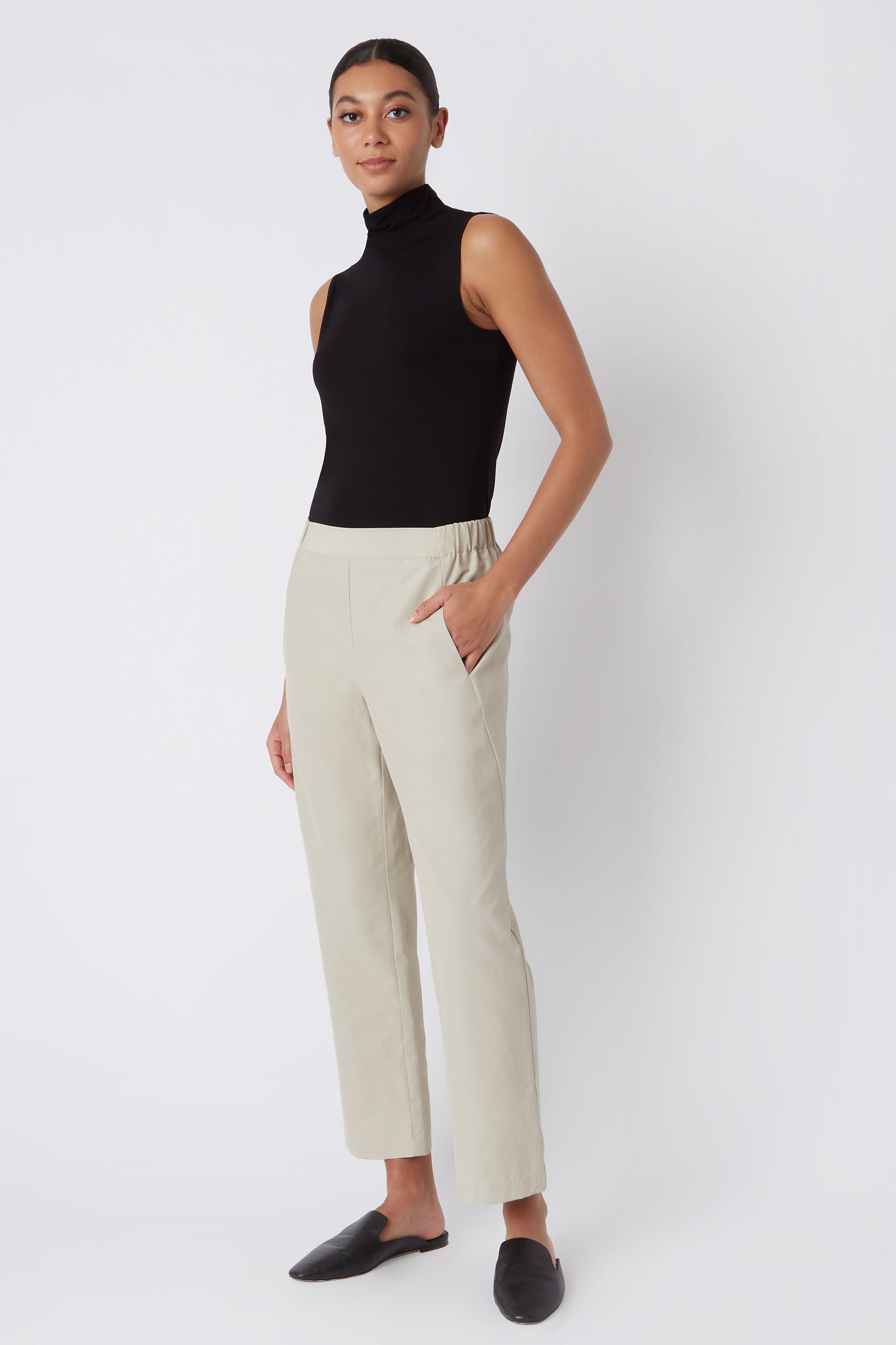 Kal Rieman Brit Crop Pant in Classic Khaki on Model with Hand in Pocket Full Front View