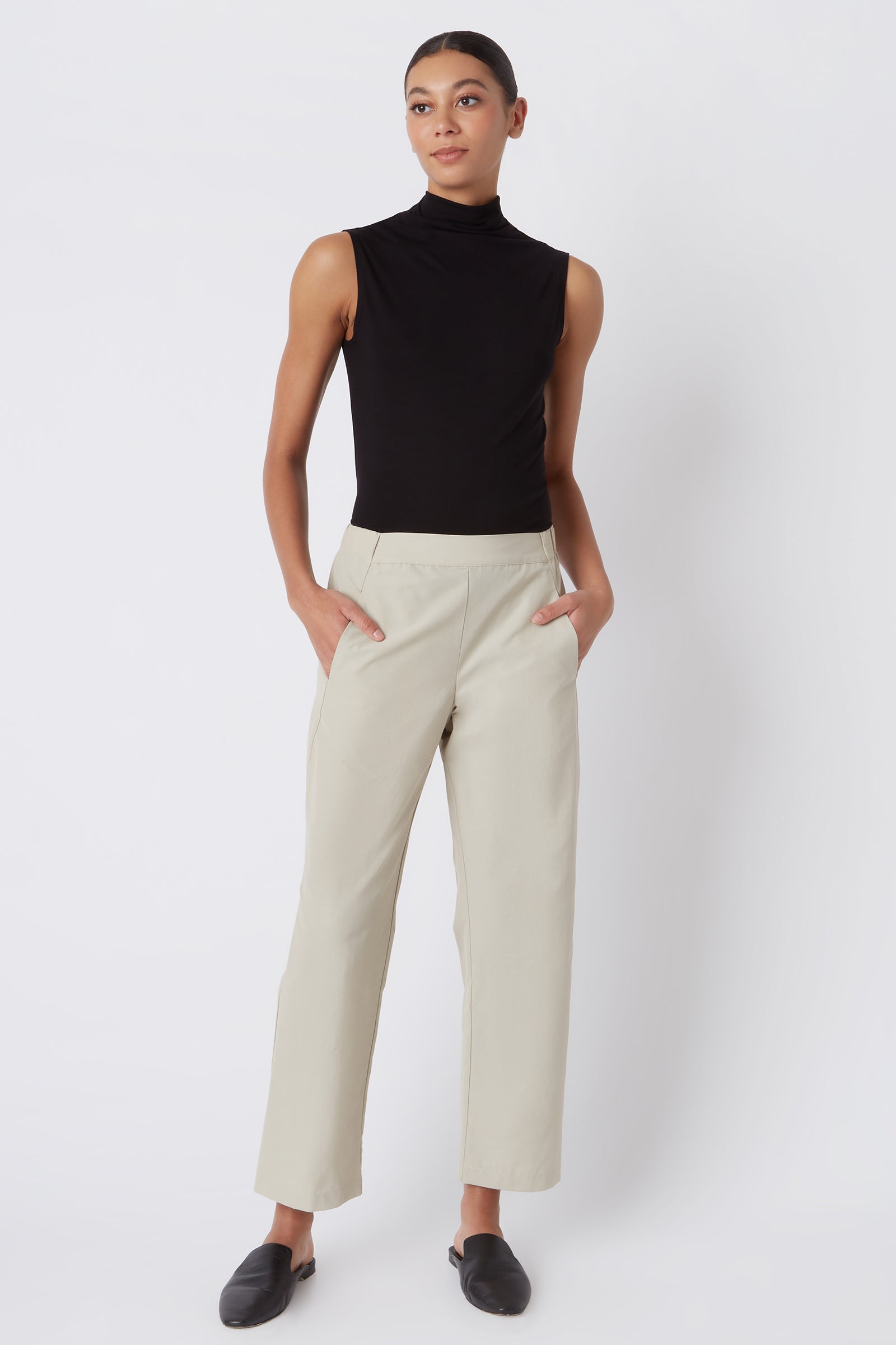 Kal Rieman Brit Crop Pant in Classic Khaki on Model with Hands in Pockets Full Front View