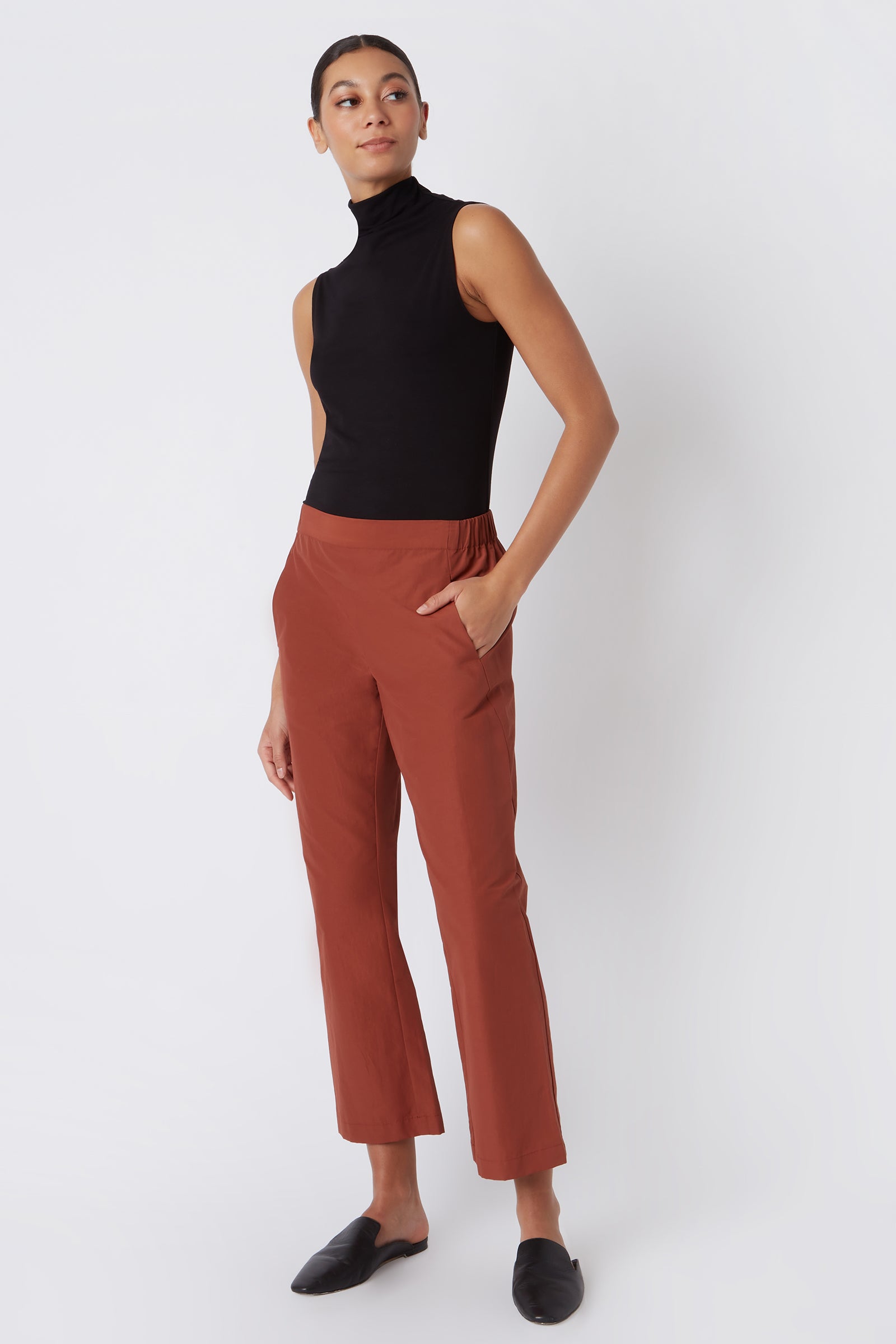 Kal Rieman Brit Crop Pant in Rust Italian Broadcloth on Model with Hand in Pocket Full Front View