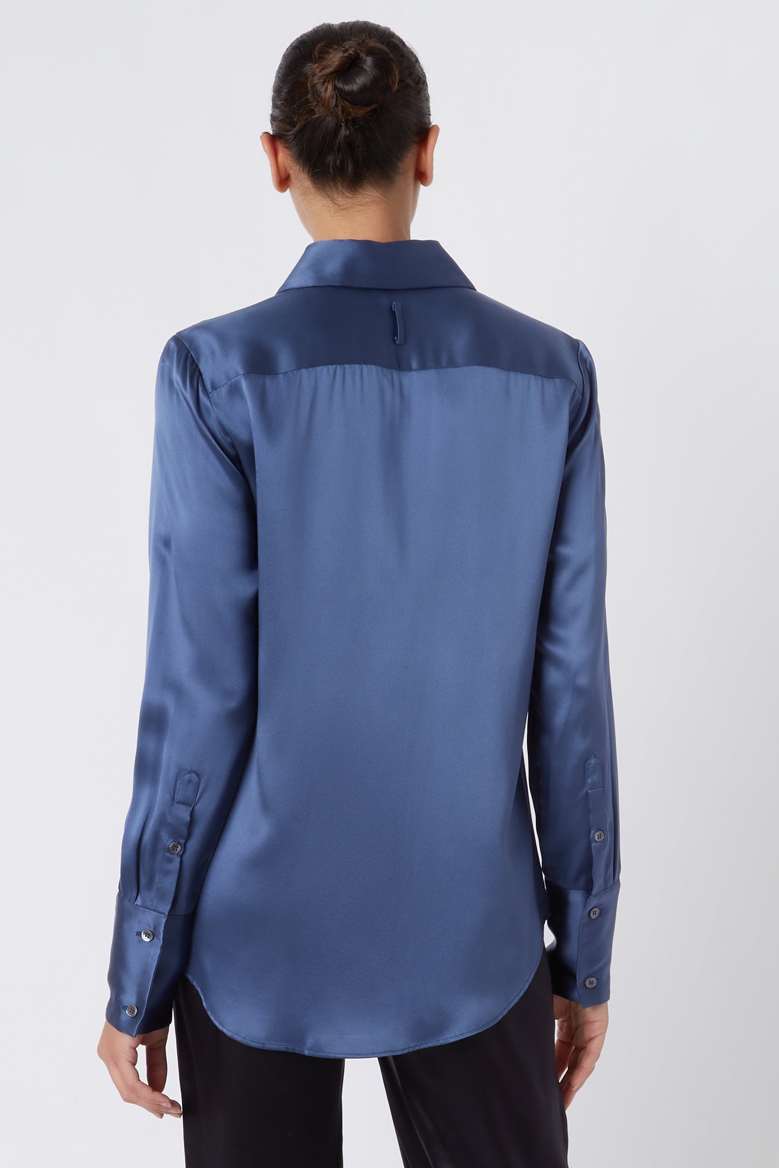 Kal Rieman Classic Tailored Blouse in Dusty Blue Silk on Model Looking Right Cropped Front View