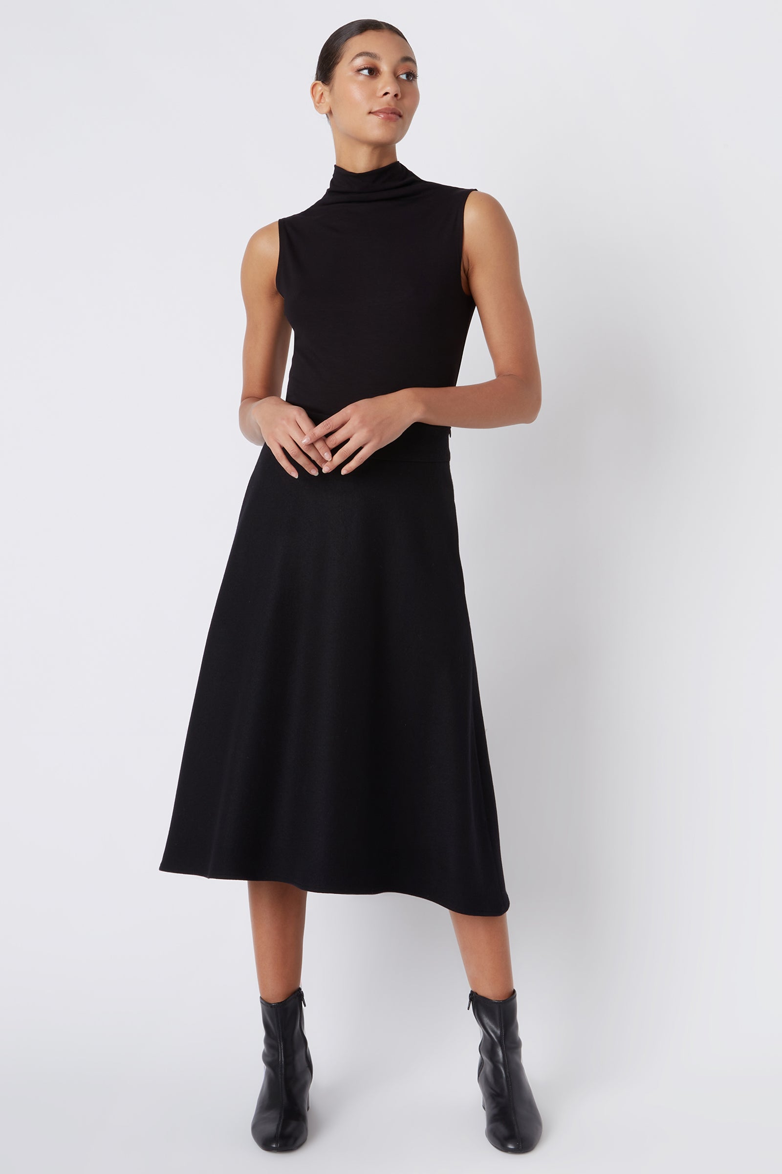 Kal Rieman Martina Kick Skirt in Black Felted Jersey on Model Looking Left Full Front View