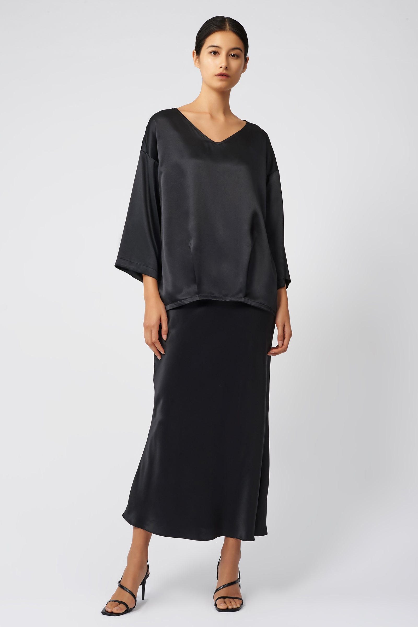 Kal Rieman Bias Silk Skirt in black on model front view