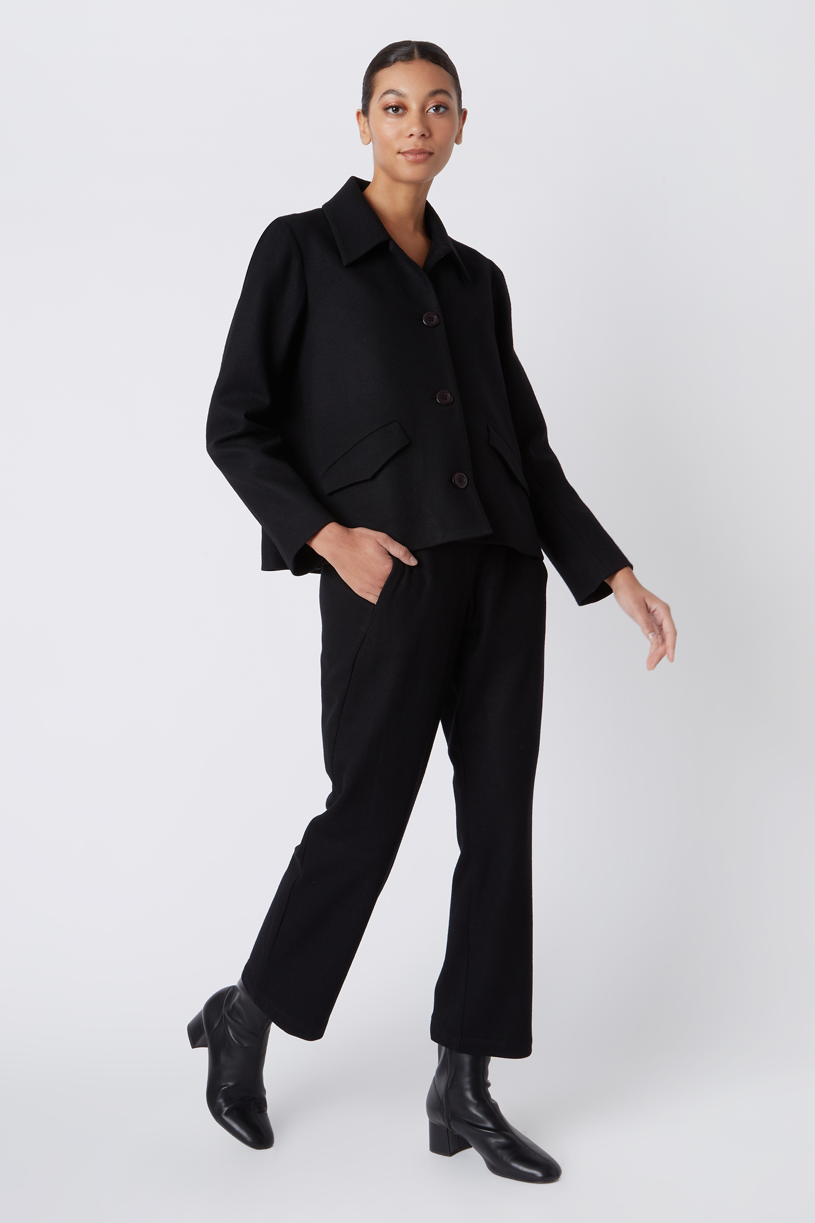 Kal Rieman Sylvie FJ Swing Jacket in Black Felted Jersey on Model Walking Full Front View