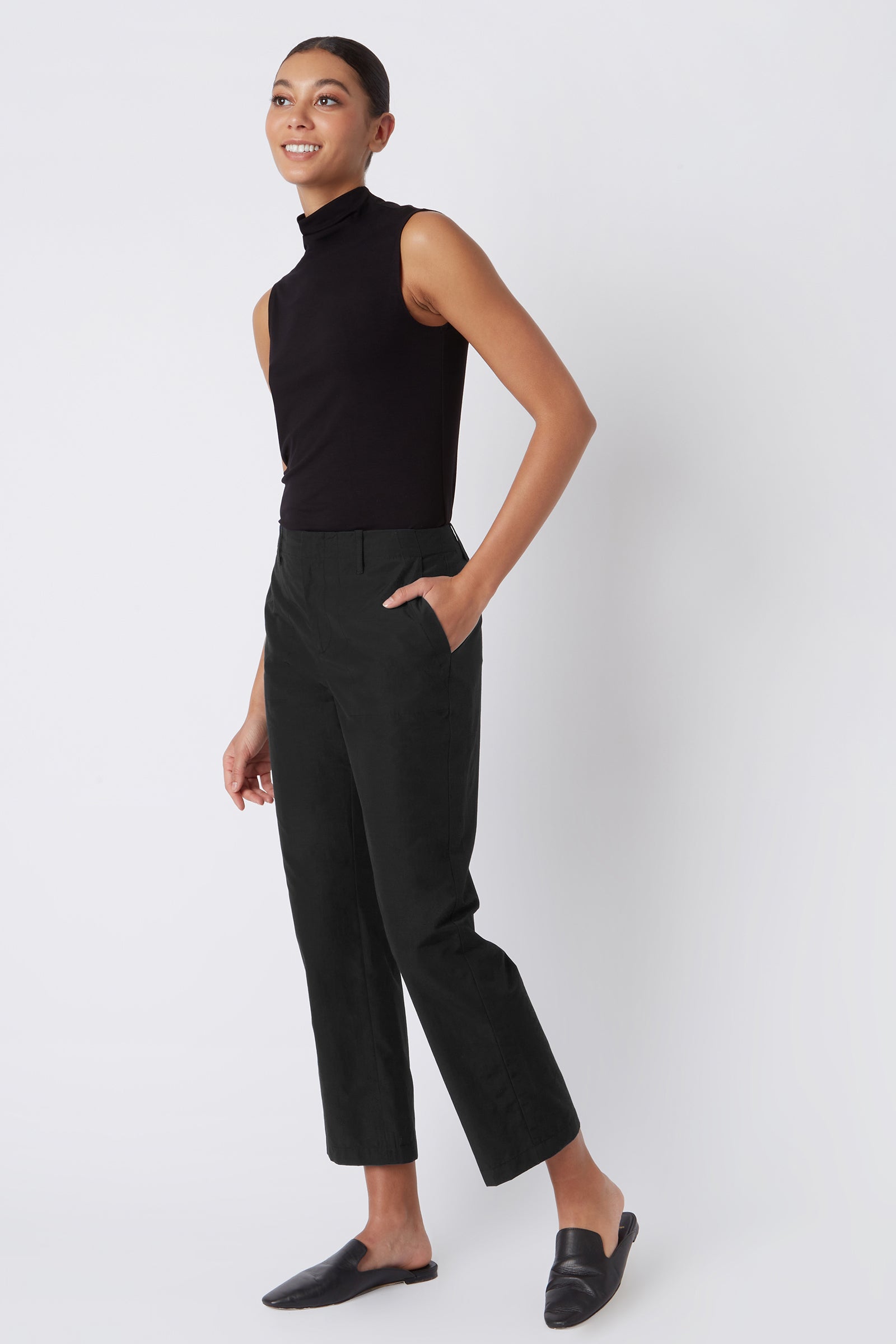 Kal Rieman Brit Crop Pant in Black on Model with Hand in Pocket Full Front View