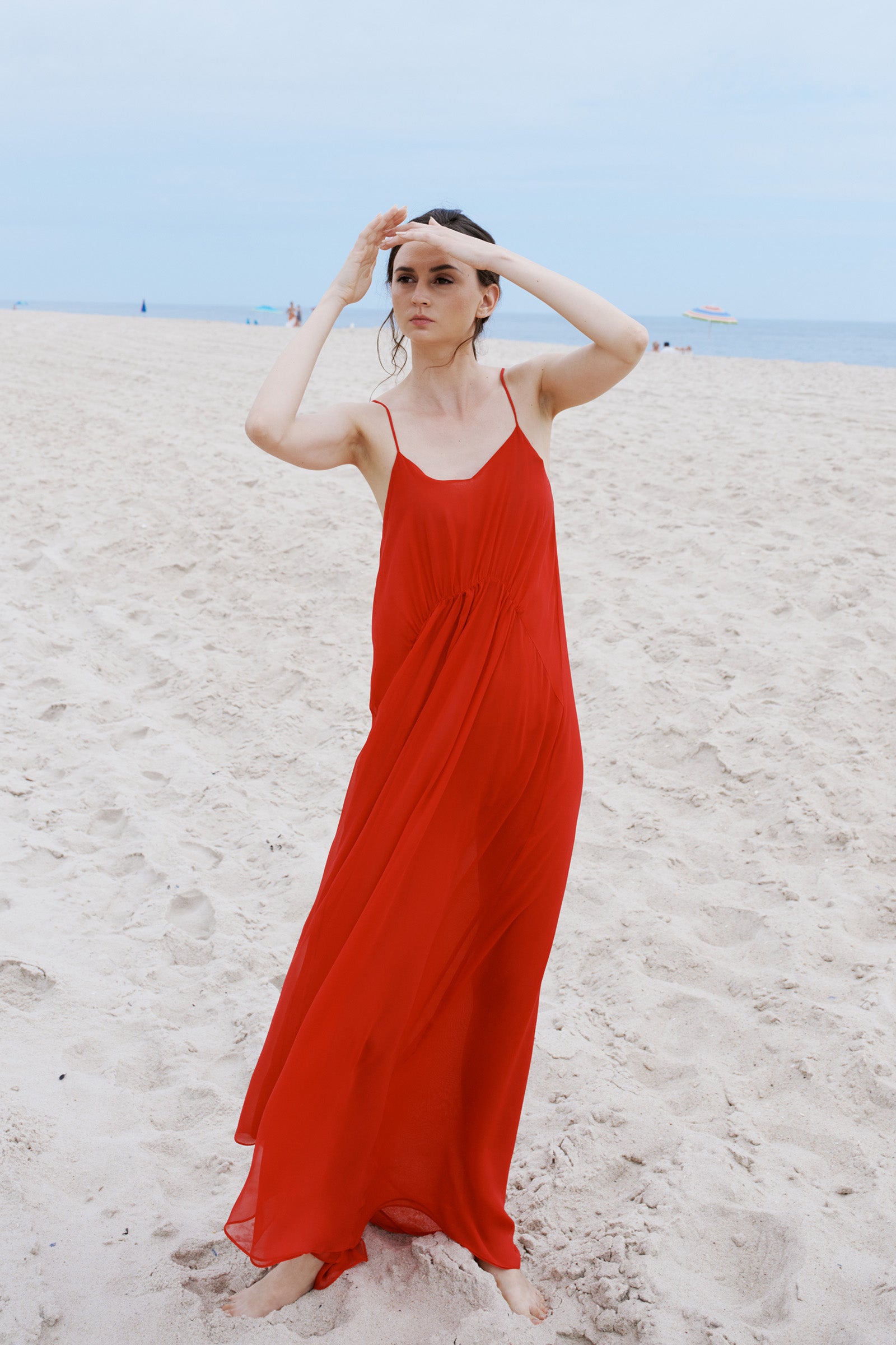 Kal Rieman Cora Shirred Maxi Dress in Red on model walking full front view