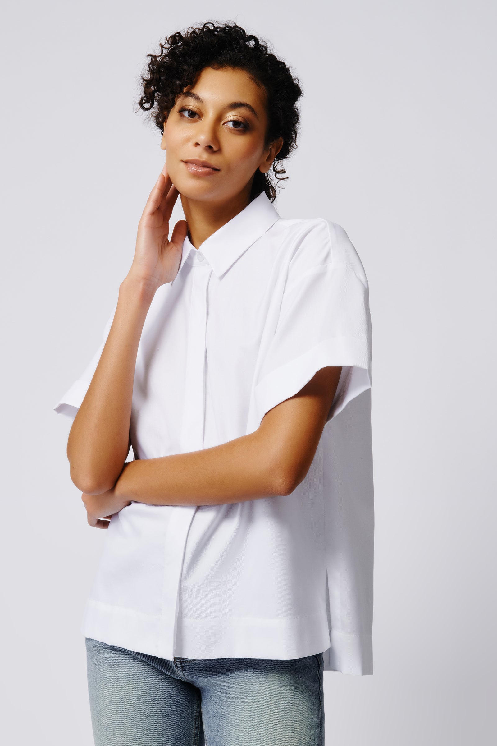 Kal Rieman Billie Cuffed Short Sleeve Shirt in White on Model Front View Crop 3