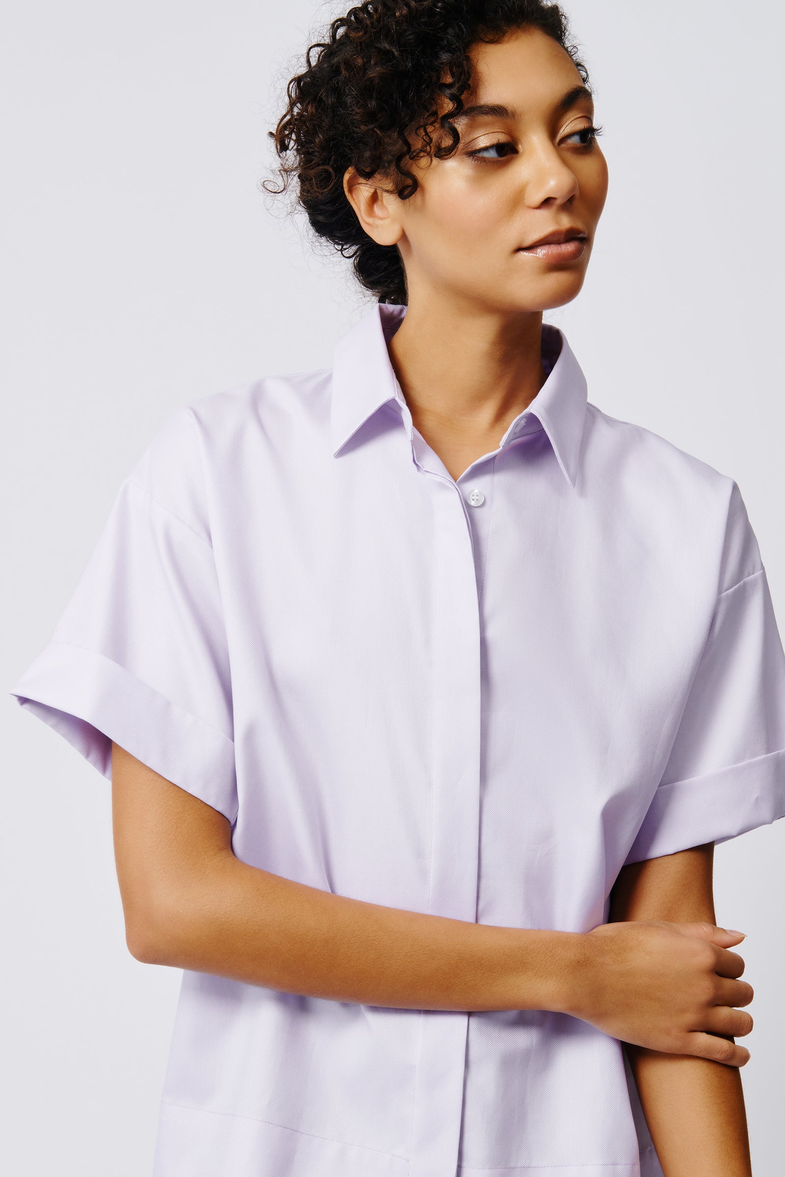 Kal Rieman Billie Cuffed Short Sleeve Shirt in Lavender on Model Side View Closeup