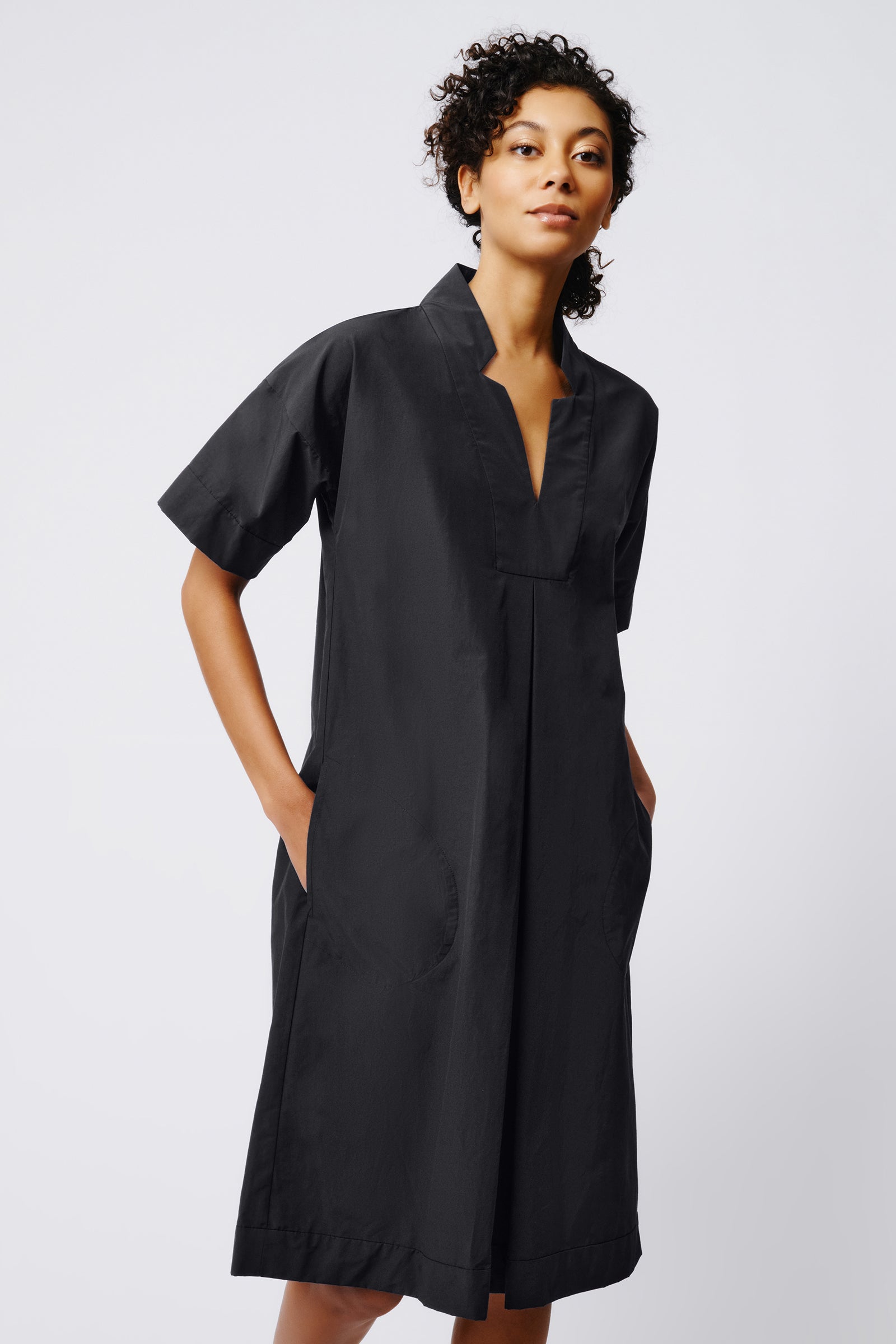 Kal Rieman Notch Placket Dress in Black on Model Front View Crop 3