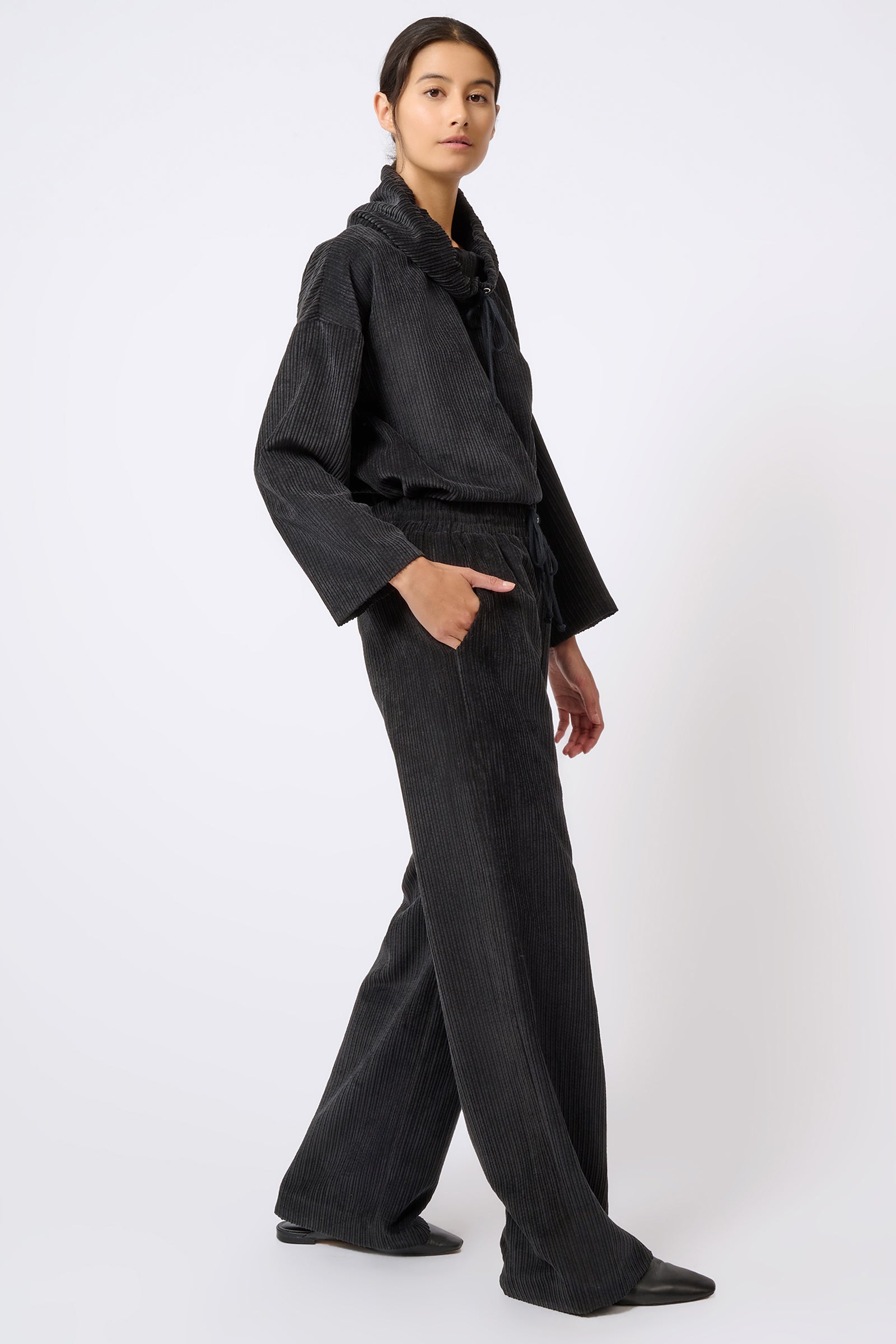 Kal Rieman Debbie Drawstring Pant in Black on Model Walking Full Side View