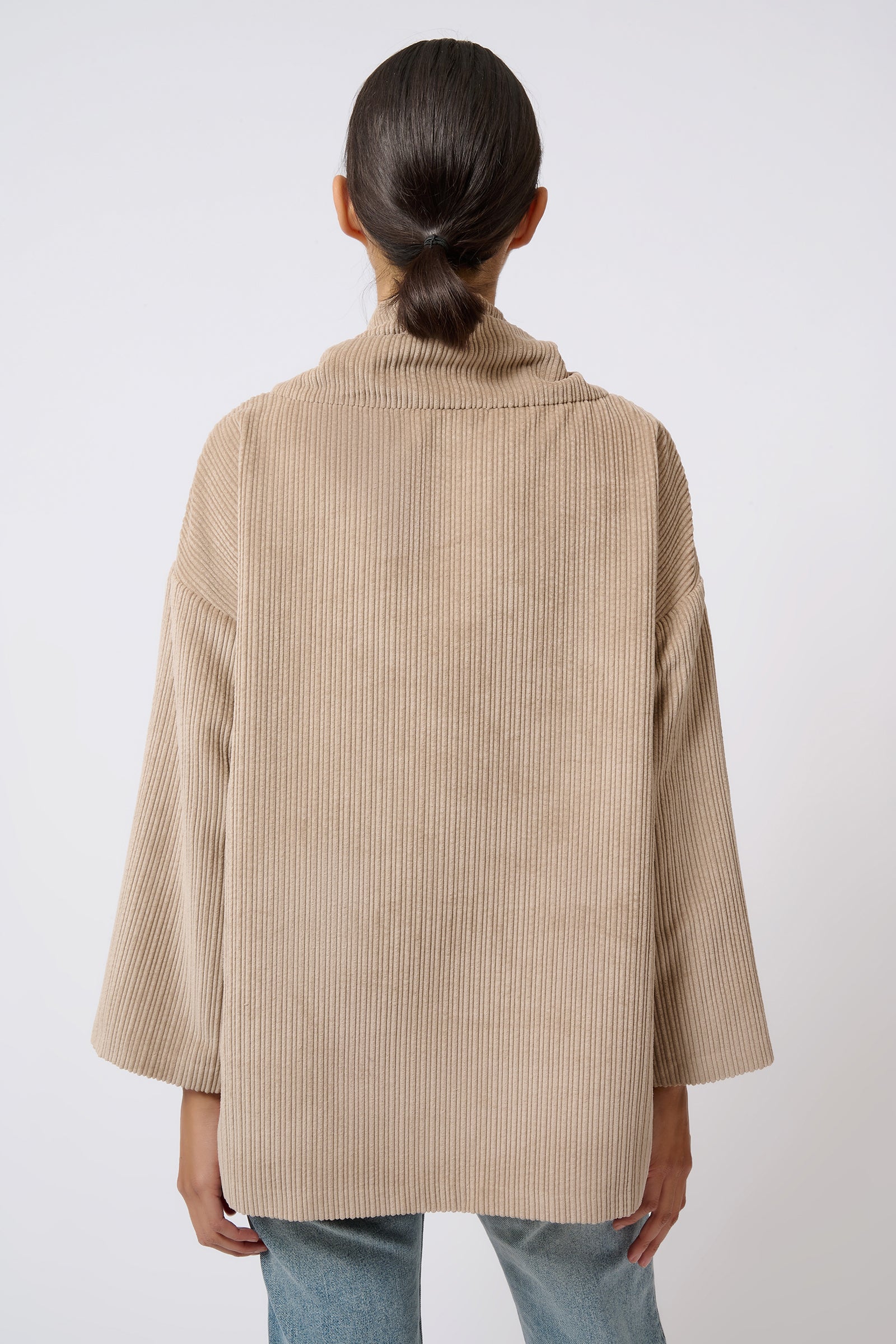 Kal Rieman Debbie Drawstring Pullover in Beige on Model with Hand on Hip Front View