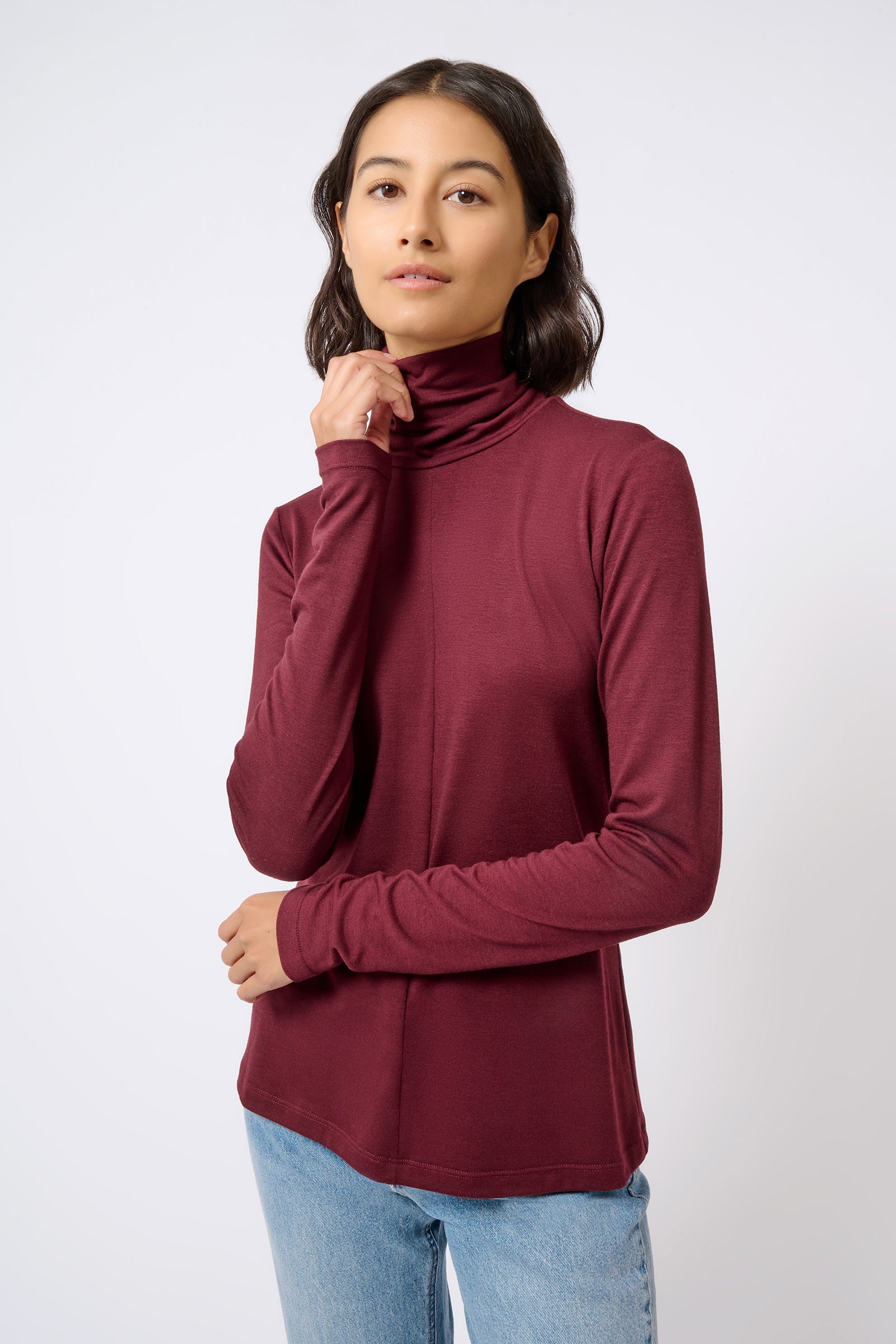 Kal Rieman Seamed Fitted Turtleneck in Wine Color on Model Front Side View