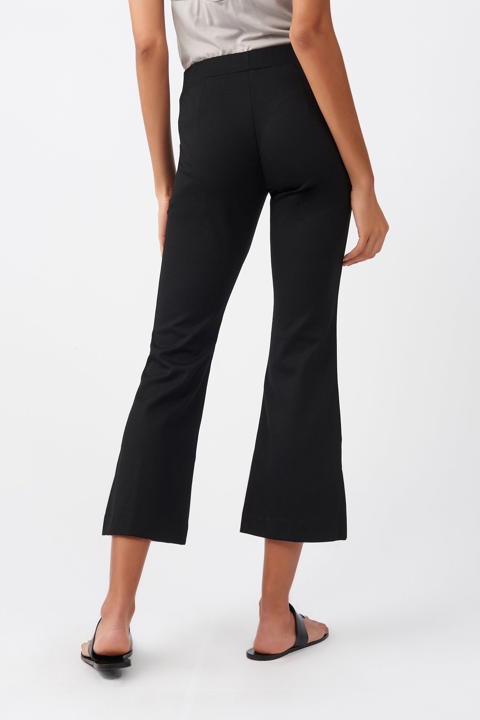 PINTUCKED KICK-FLARE TROUSERS - BLACK - COS
